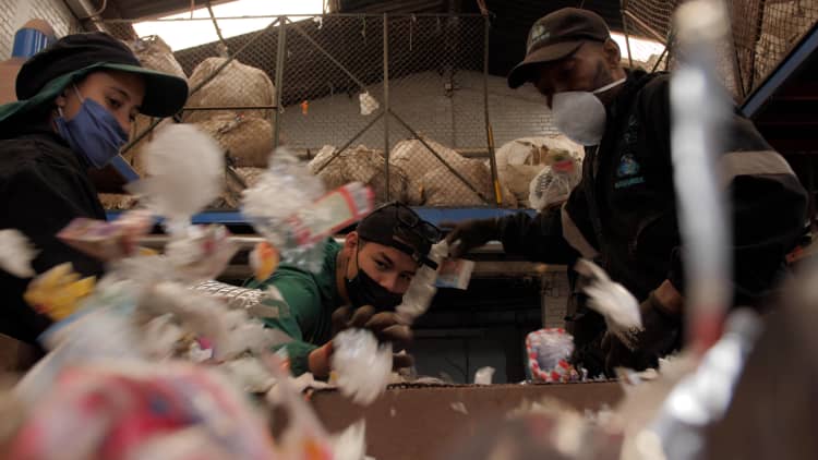 These organizations are selling plastic offsets to help build recycling infrastructure