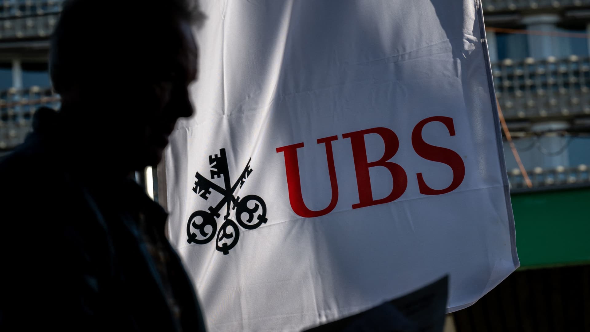 UBS beats earnings expectations, announces up to  billion share buyback