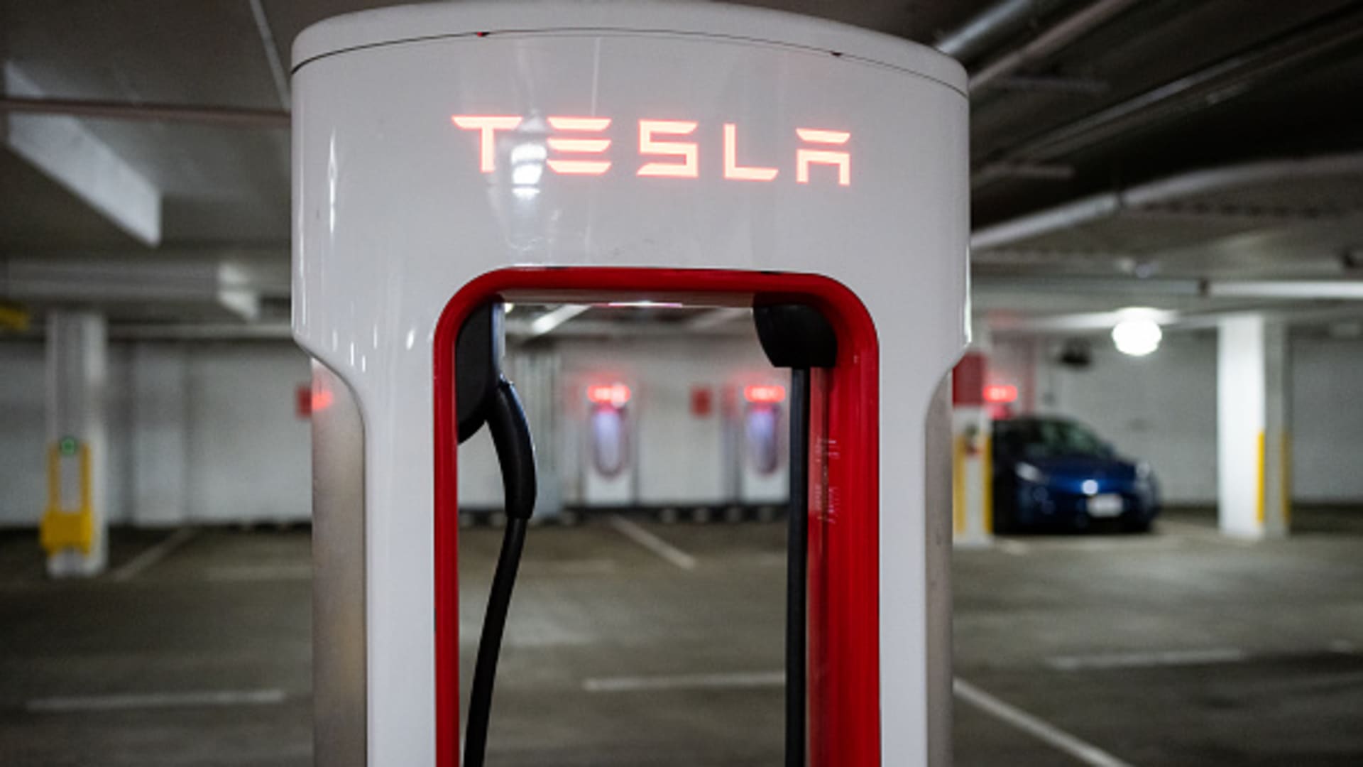 A Tesla electric vehicle charging station stands in a parking garage in Washington on Friday, April 7, 2023. (Bill Clark/CQ-Roll Call, Inc via Getty Images)