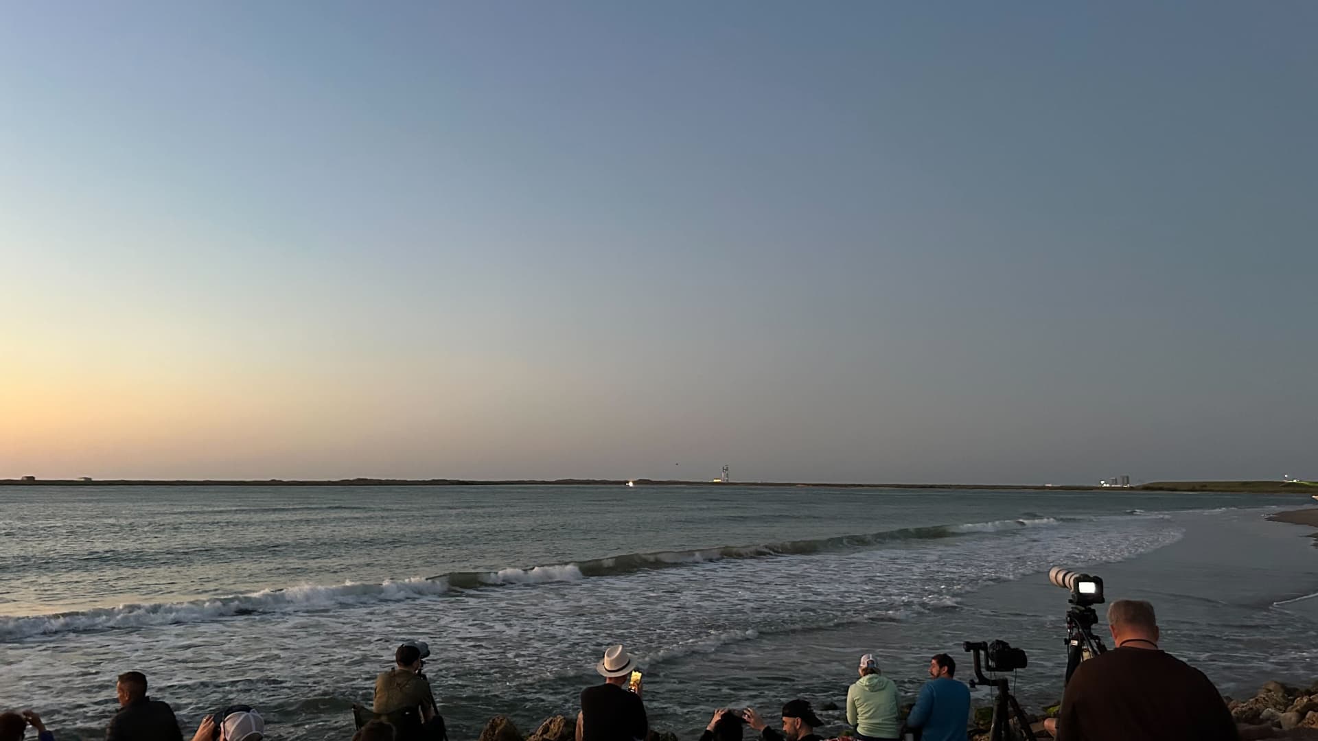 Members of the press gather on South Padre Island, about 5 miles from SpaceX's private Starship facility, for the first attempt at orbital launch on Monday, April 17, 2023.