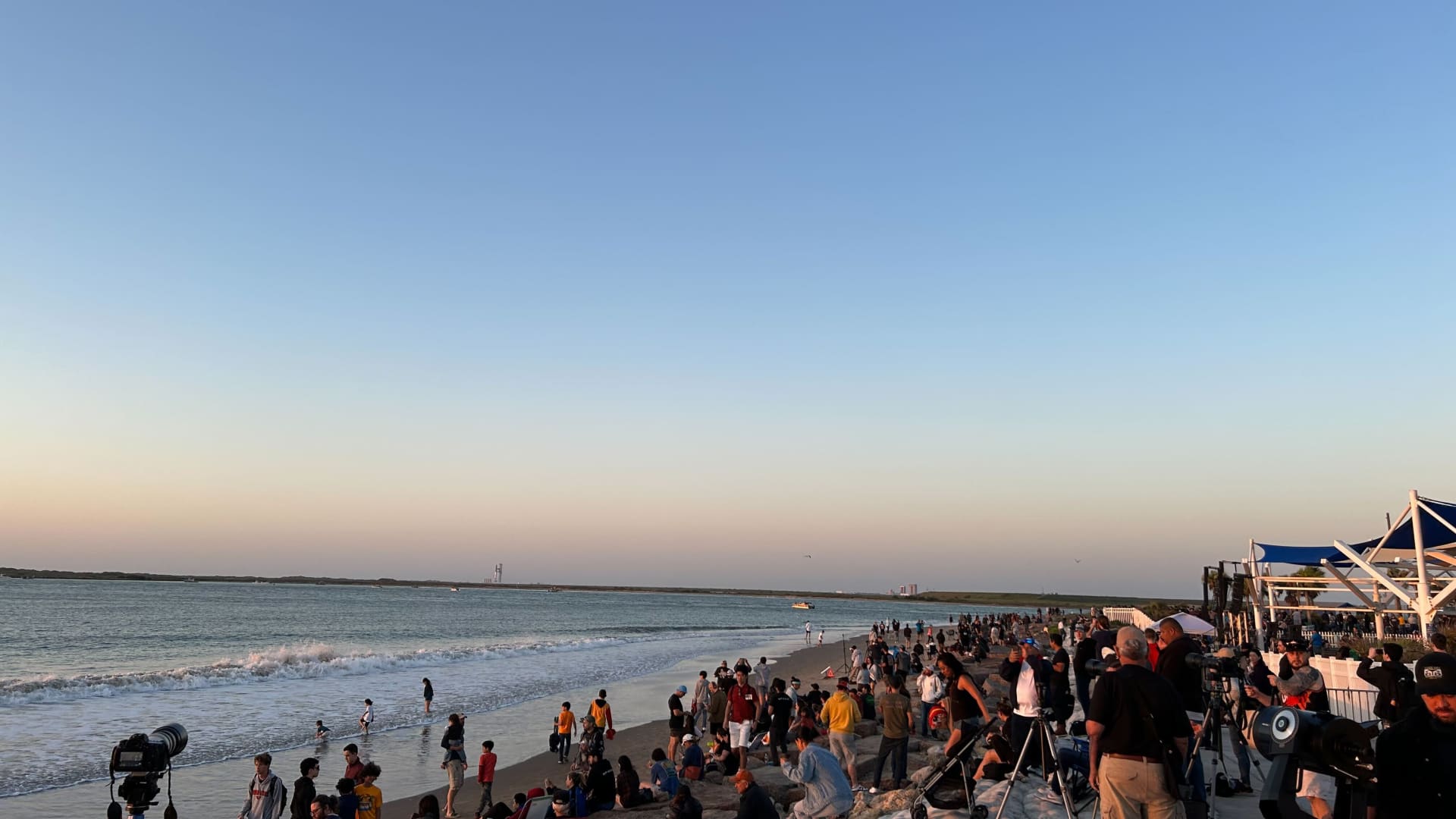 Enthusiasts and onlookers gather on South Padre Island, Texas, to watch SpaceX attempt the first orbital launch of its Starship rocket.