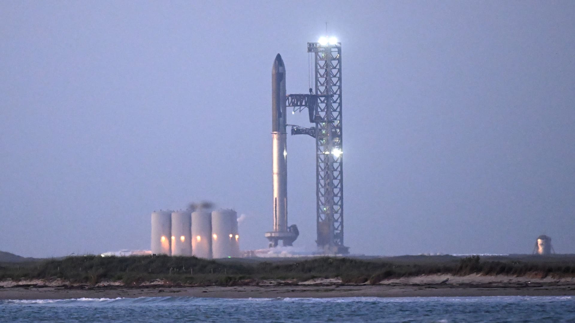 A view of the SpaceX Starship as it stands on the launch pad ahead of a flight test from Starbase in Boca Chica, Texas, early on April 17, 2023.