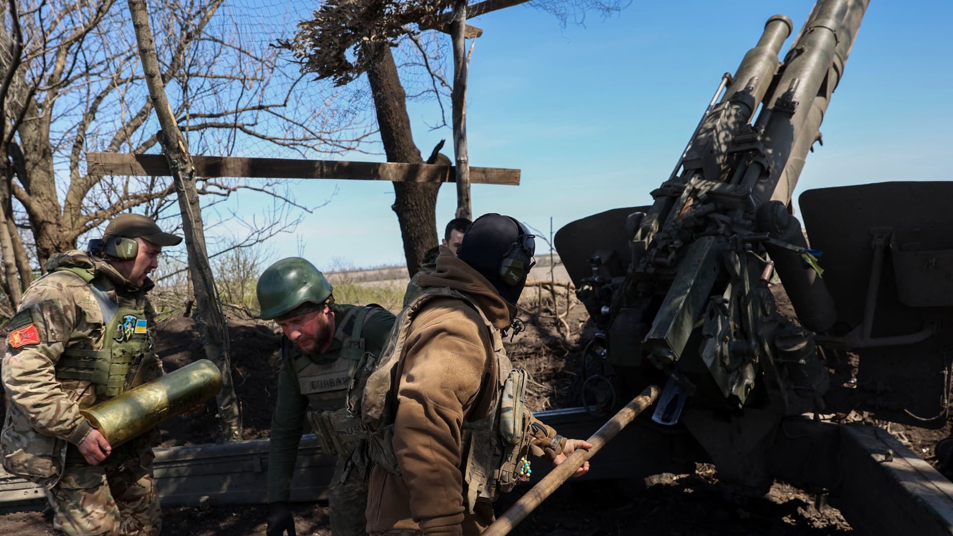 Ukrainian artillerymen prepare a BM-21 Grad multiple rocket launcher to fire towards Russian positions on the frontline, in Donetsk region on April 17, 2023.