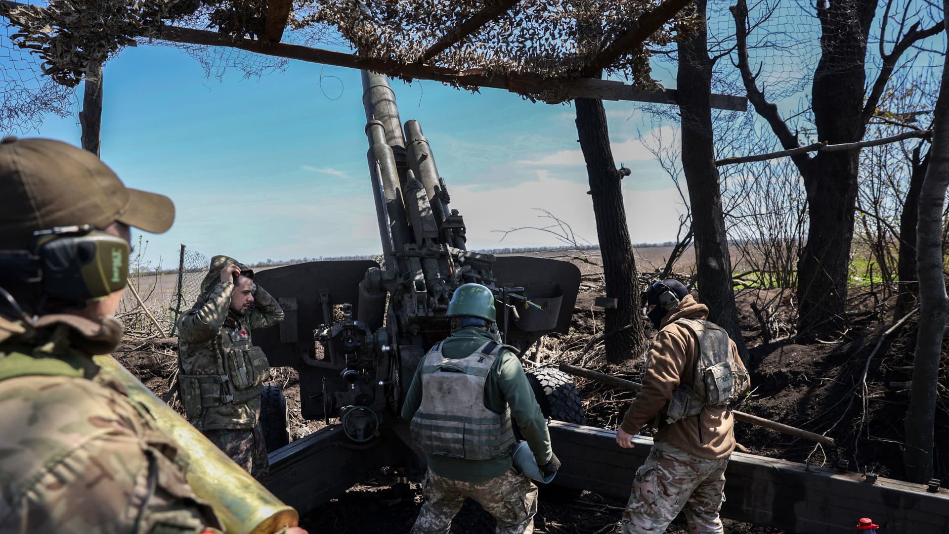 Ukrainian artillerymen prepare a BM-21 Grad multiple rocket launcher to fire towards Russian positions on the frontline, in Donetsk region on April 17, 2023. 