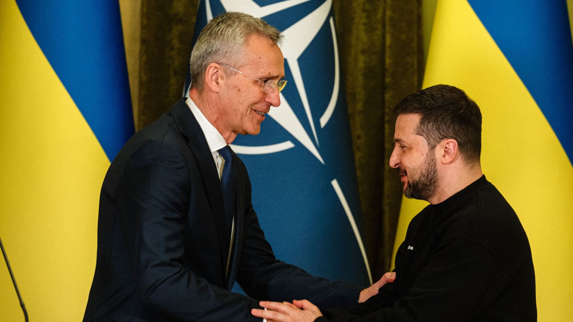 NATO head Jens Stoltenberg (L) shakes hands with Ukrainian President Volodymyr Zelenskyy at the end of a joint press conference in Kyiv, on April 20, 2023.