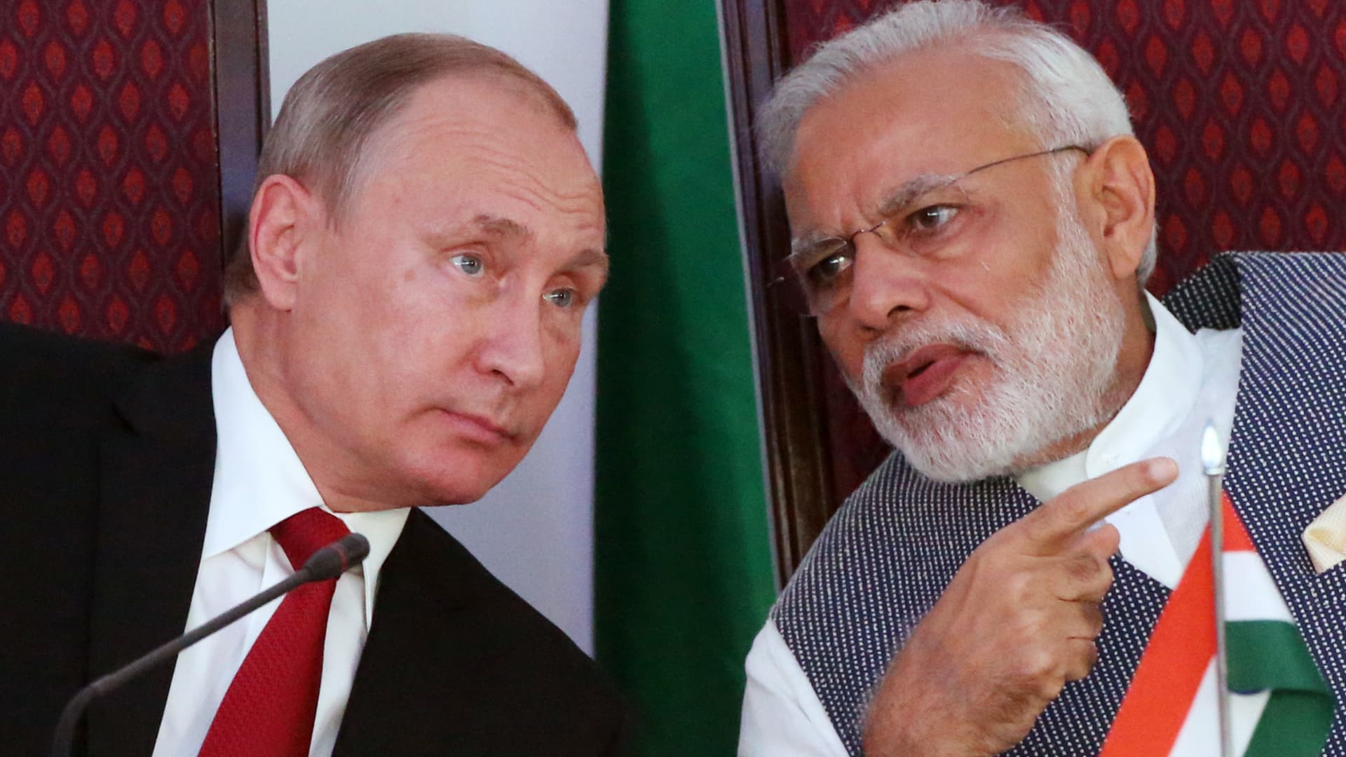 BENAULIM, INDIA - OCTOBER, 15 Russian President Vladimir Putin speaks to Indian Prime Minister Narendra Modi during their meeting at Taj Exotic Hotel on October, 15, 2016 in Benaulim, Goa, India. (Photo by Mikhail Svetlov/Getty Images)