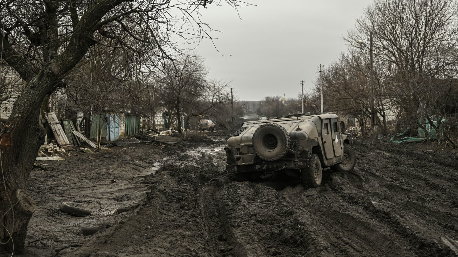 A Ukrainian armored vehicle drives on a muddy road near Bakhmut in the Donbas region, on March 9, 2023. 