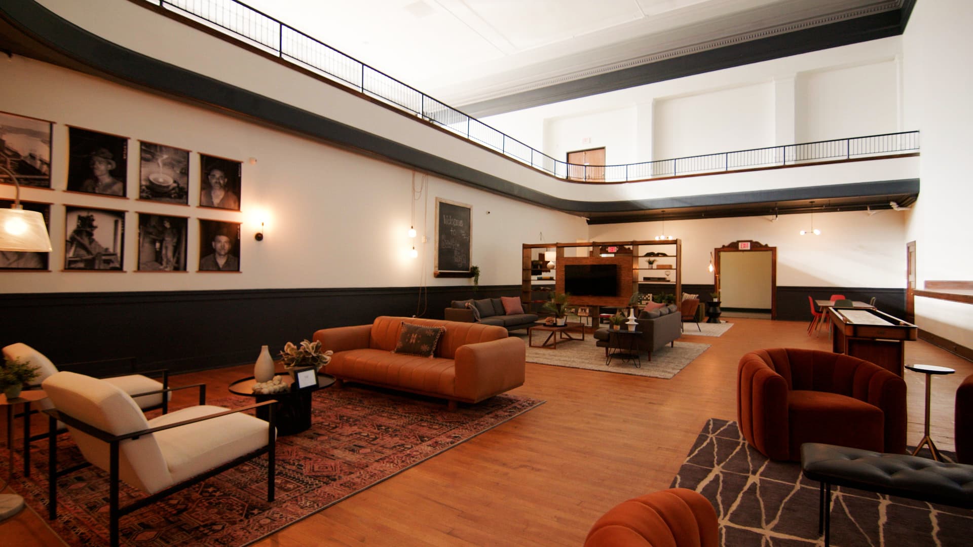 The partners converted the old high school's auditorium into a resident's lounge.