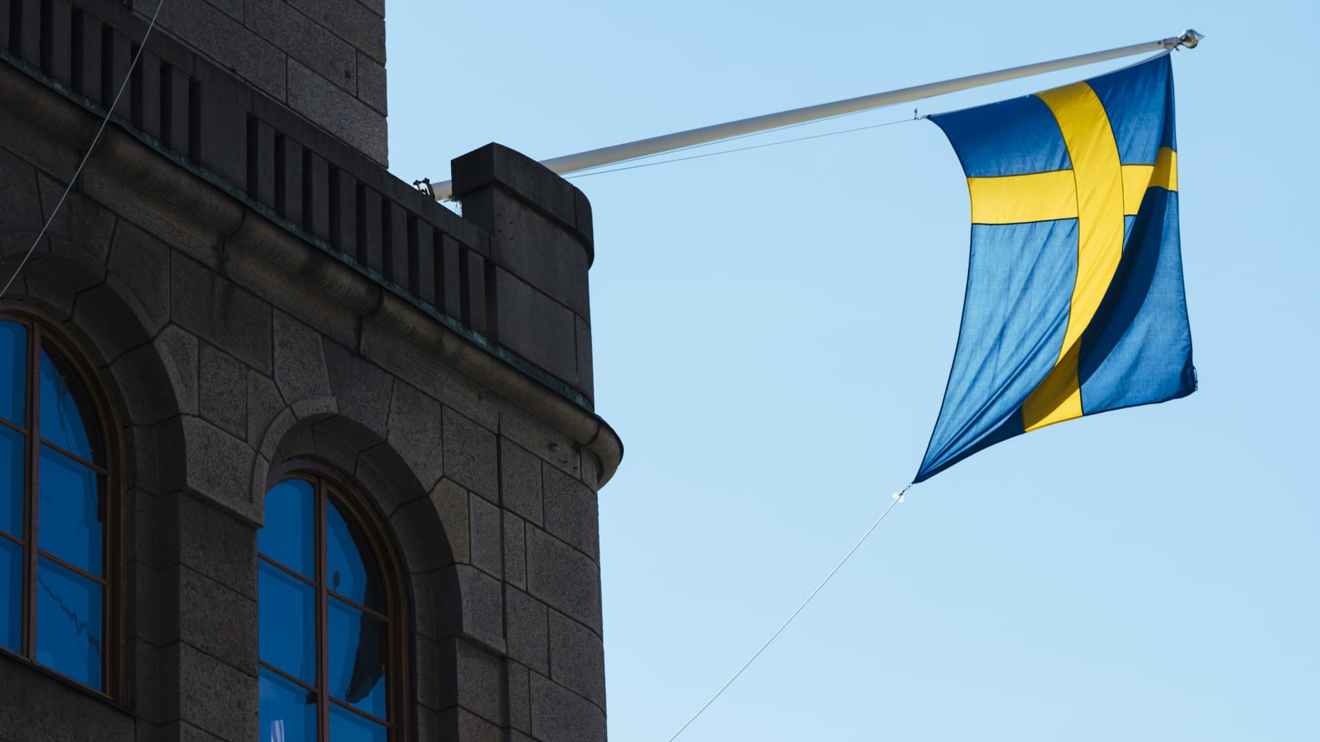 The Swedish flag hangs on the country's central bank.
