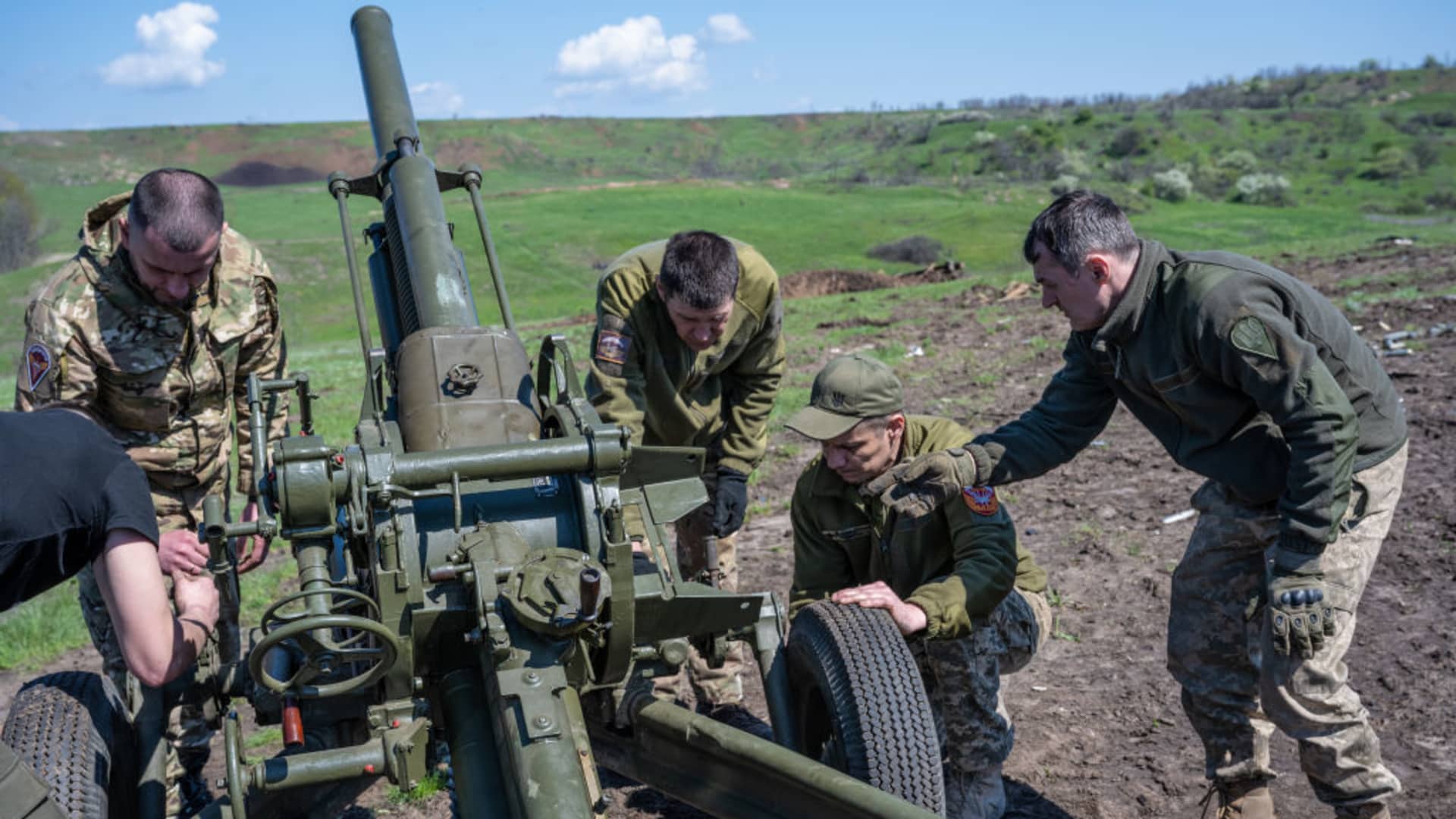 Ukrainian soldiers practice firing a Soviet-made 82mm gun-mortar, as Ukrainian Armed Forces units train for a critical and imminent spring counteroffensive against Russian troops, which invaded 14 months earlier, in the Donbas region, Ukraine, on April 26, 2023.