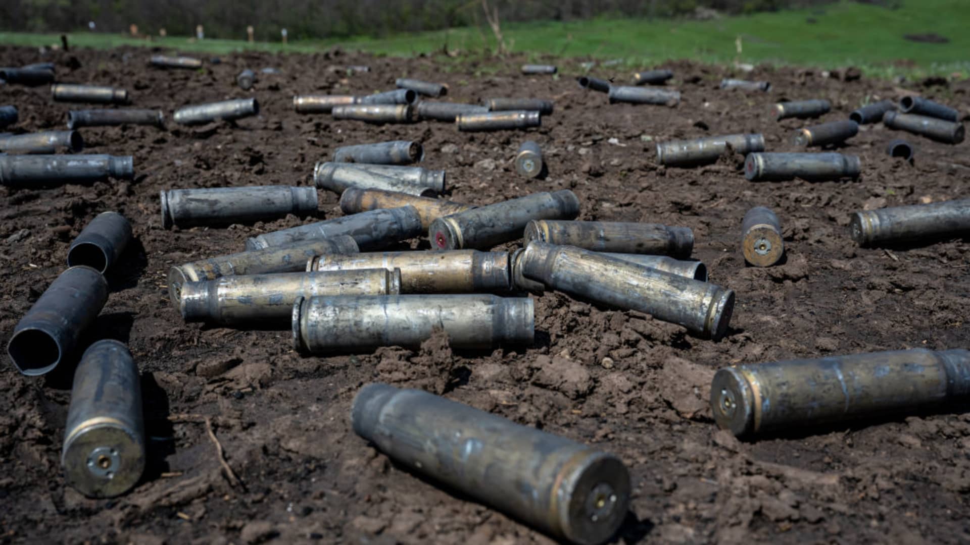 Spent cartridges from 30mm guns fired by armored vehicles litter the ground, as Ukrainian Armed Forces brigades train for a critical and imminent spring counteroffensive against Russian troops, which invaded 14 months earlier, in the Donbas region, Ukraine, on April 26, 2023.