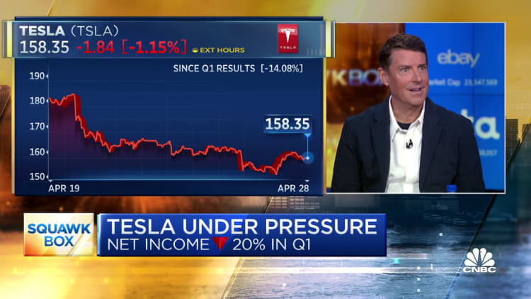 Elon Musk is good at delivering on promises but not on time, says ex-Tesla president John McNeill