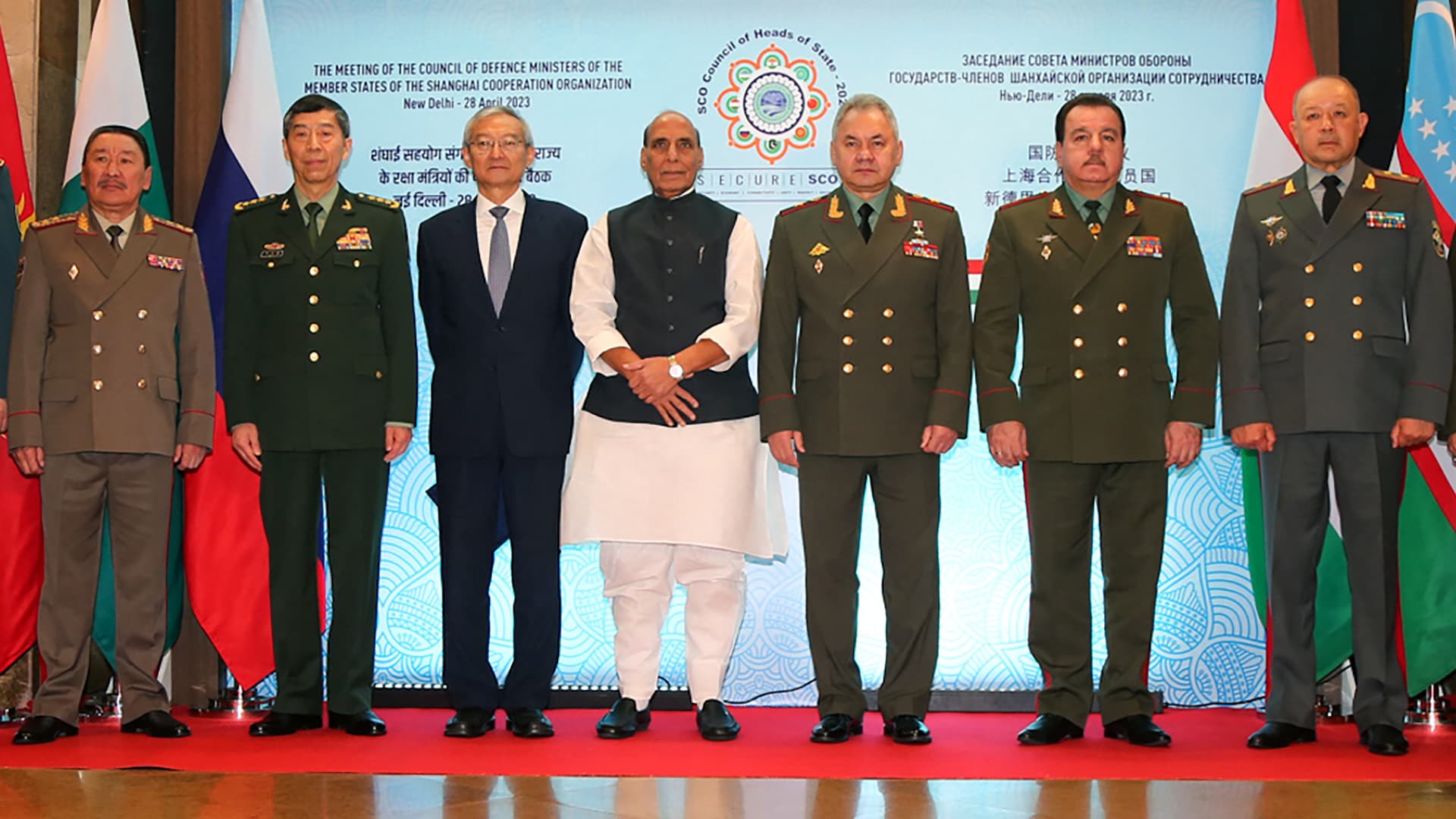 This handout photograph taken on April 28, 2023 and released by the Indian Ministry of Defence shows (L to R) Kyrgyzstan's Defence Minister Bekbolotov Baktybek Asankalievich, Chinese Defence Minister Li Shangfu, Shanghai Cooperation Organisation (SCO) Secretary-General Zhang Ming, Indian Defence Minister Rajnath Singh, Russian Defence Minister Sergei Shoigu, Tajikistan Defence Minister Sherali Mirzo and Uzbekistan Defense Minister Bakhodir Kurbanov posing for group picture during the SCO meet in New Delhi.