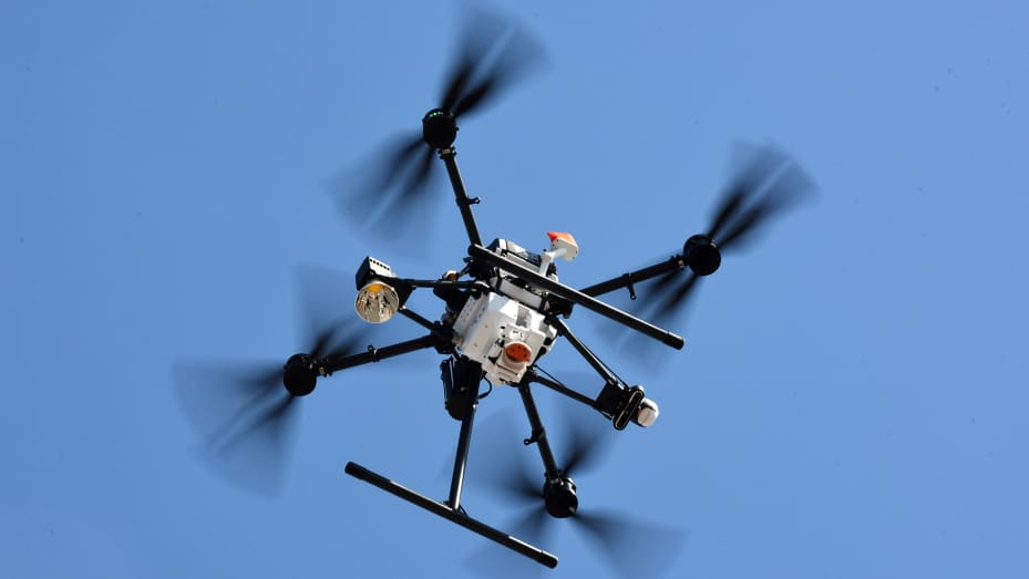 CLERMONT, FLORIDA, UNITED STATES - MARCH 30: A delivery drone takes flight during a functional test at the DroneUp hub in the parking lot at the Walmart Supercenter in Clermont, Florida, United States on March 30, 2023. Walmart customers who live within one mile of the store can have certain items weighing up to 10 pounds delivered to their home by drone within 30 minutes for a $3.99 fee. (Photo by Paul Hennesy/Anadolu Agency via Getty Images)