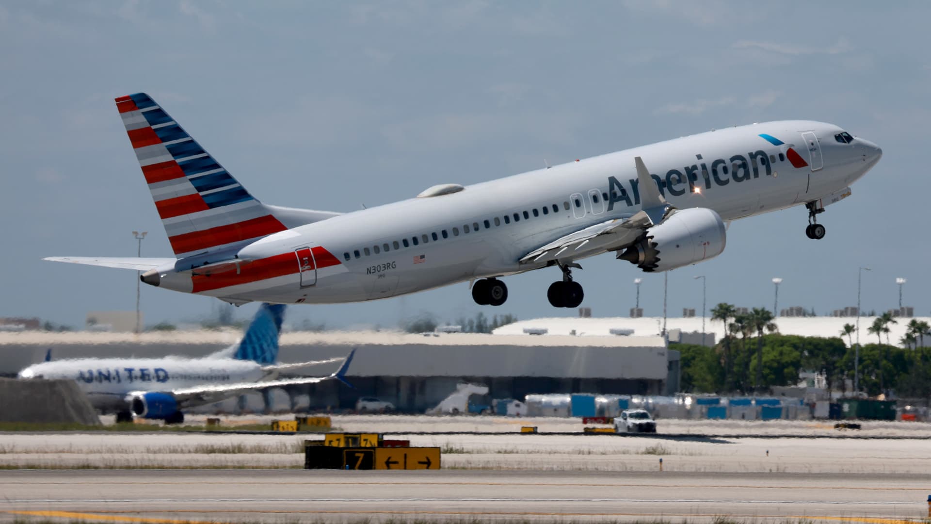 American Airlines raises profit forecast thanks to stronger demand and cheaper fuel