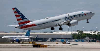 American Airlines raises profit forecast thanks to stronger demand, cheaper fuel