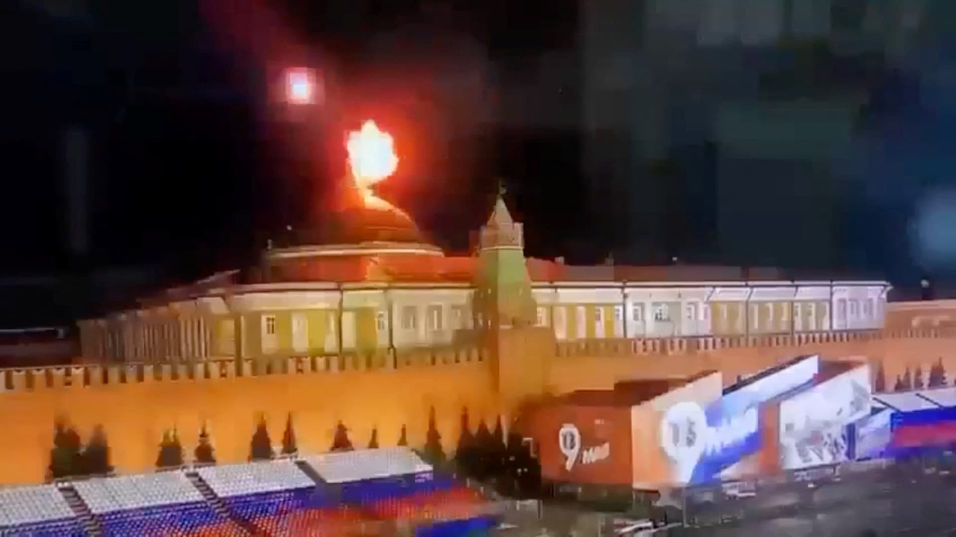 A still image taken from video shows a flying object exploding in an intense burst of light near the dome of the Kremlin Senate building during the alleged Ukrainian drone attack in Moscow, Russia, in this image taken from video obtained by Reuters May 3, 2023. 
