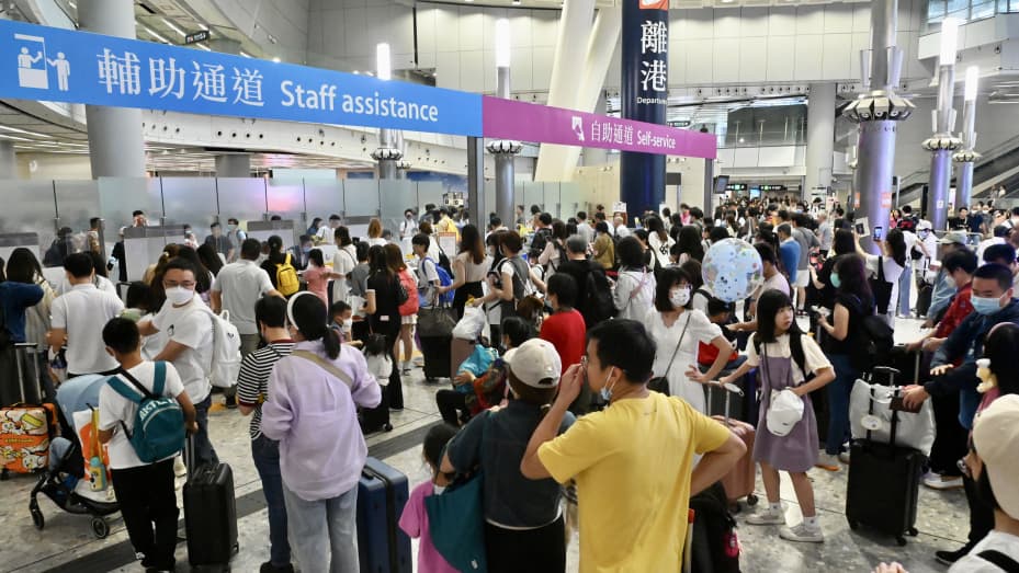 Tourists from the Chinese mainland wait at the departure hall of Hong Kong West Kowloon Station on the last day of May Day holiday on May 3, 2023.