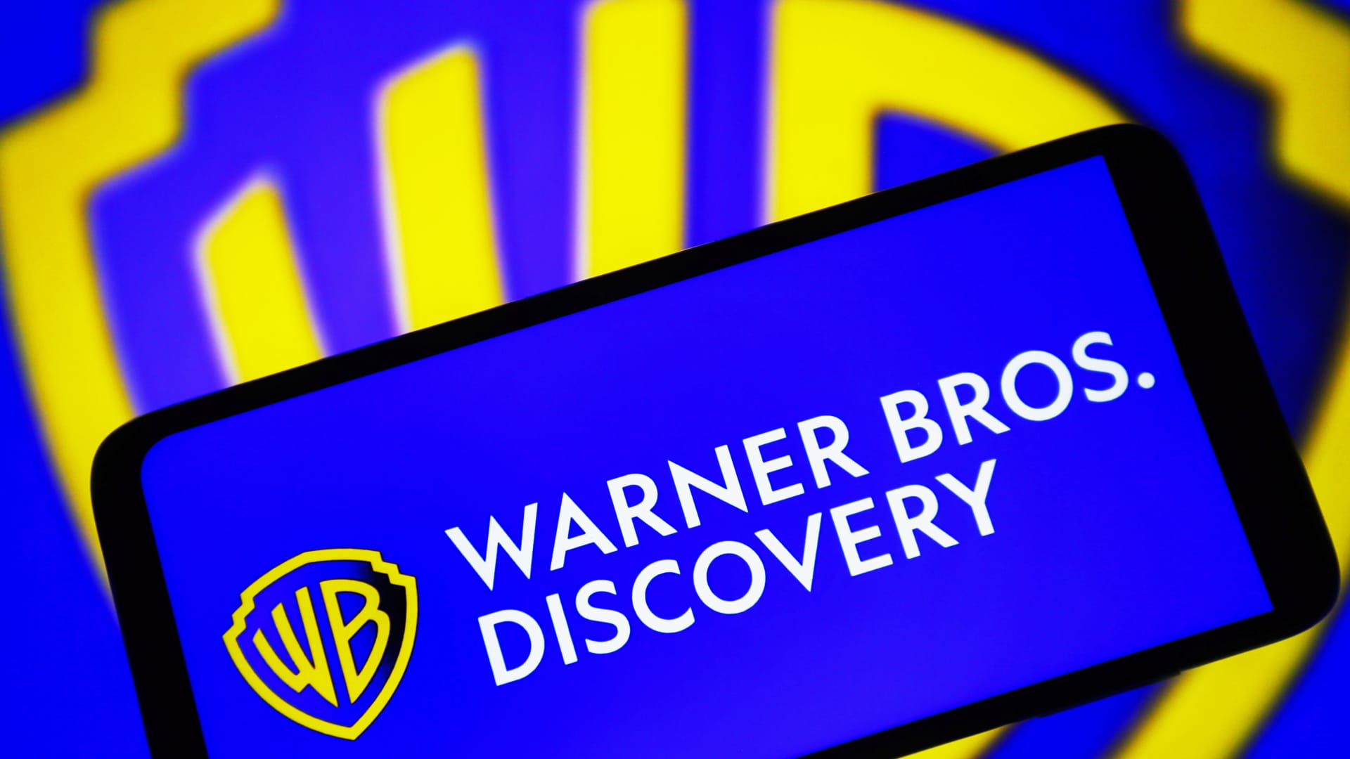 Warner Bros. Discovery stock rises for second straight working day as business pays down personal debt
