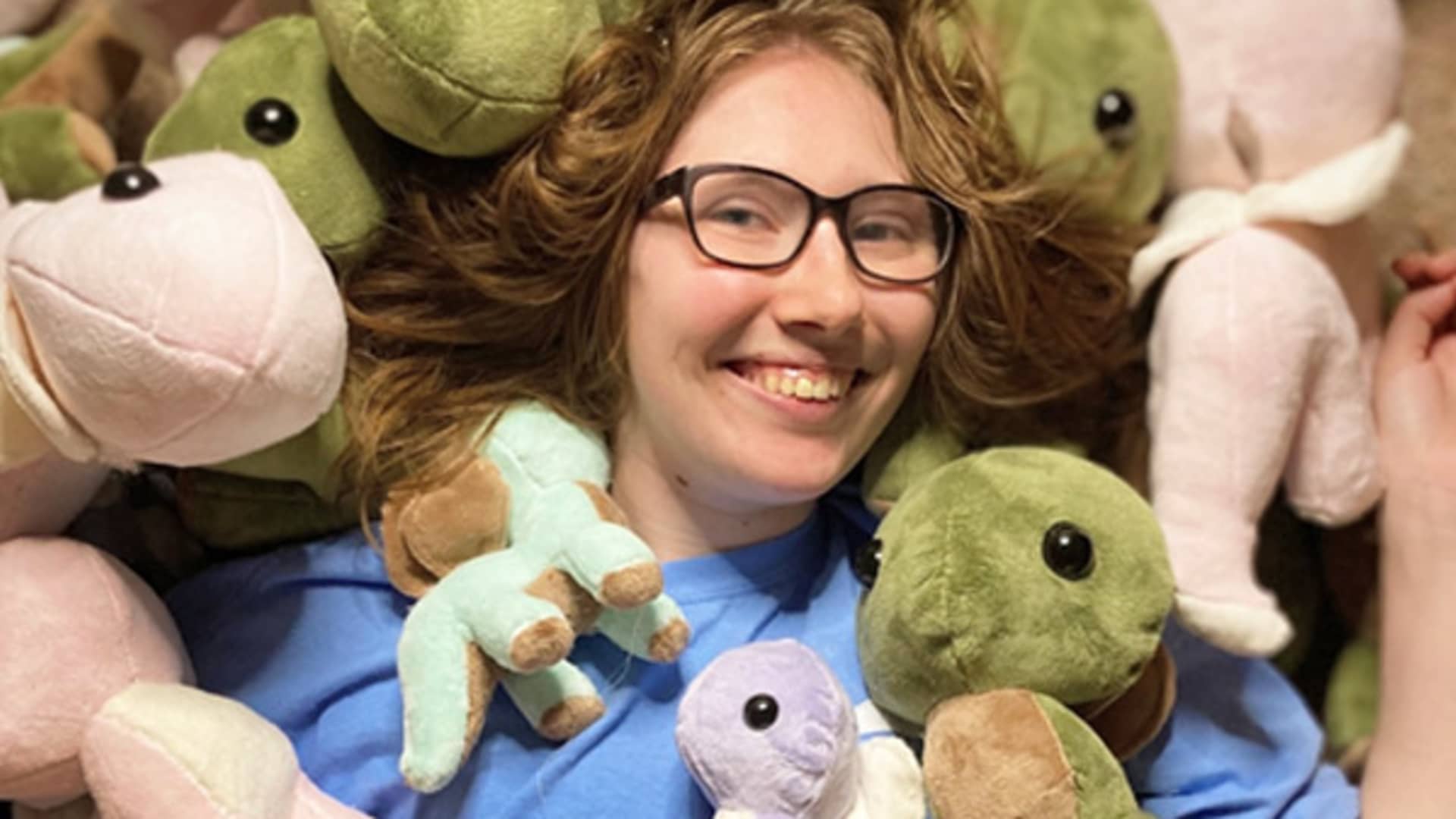 Emily Foster with her stuffed animals.