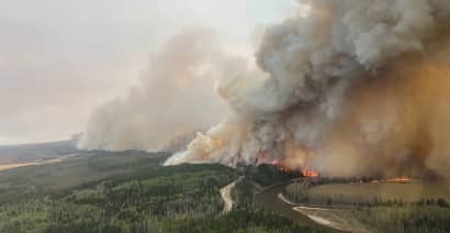 More than 24,000 people evacuated in Western Canada as 103 wildfires burn