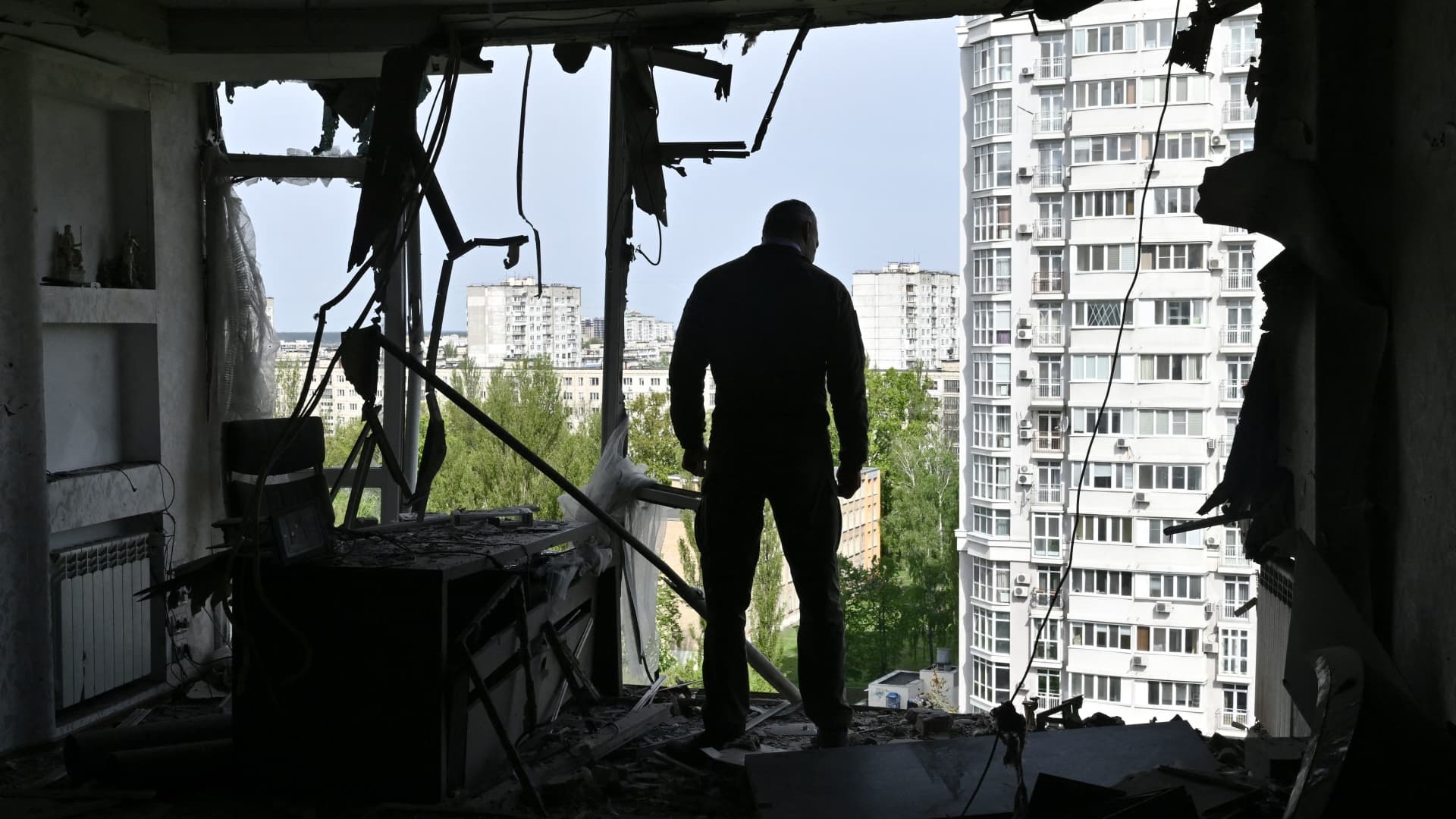 Mayor of the Ukrainian capital Kyiv, Vitali Klitschko, examines high-rise residential building damaged by remains of a shot down Russian drone in Kyiv on May 8, 2023, amid the Russian invasion of Ukraine.