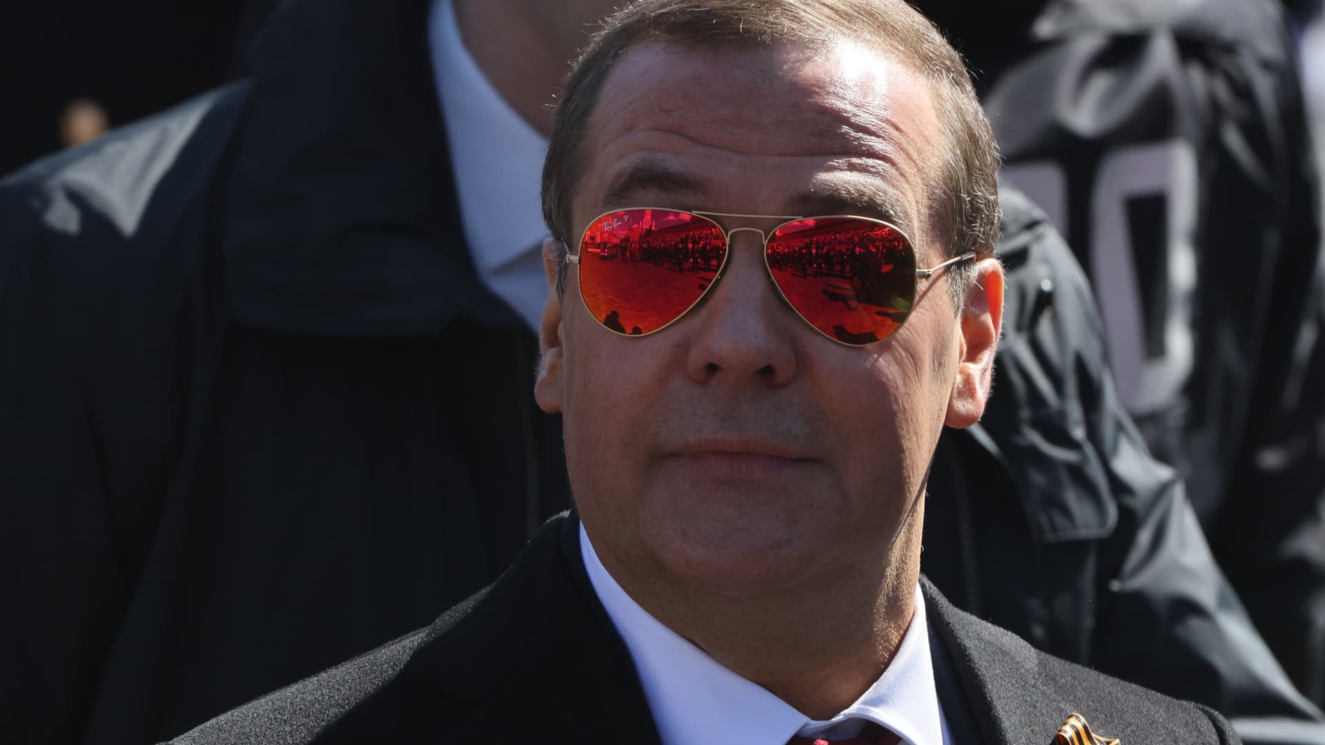 Russian Security Council Deputy Chairman Dmitry Medvedev wearing sunglasses arrives to the Victory Day Red Square Parade on May 9, 2023 in Moscow, Russia.