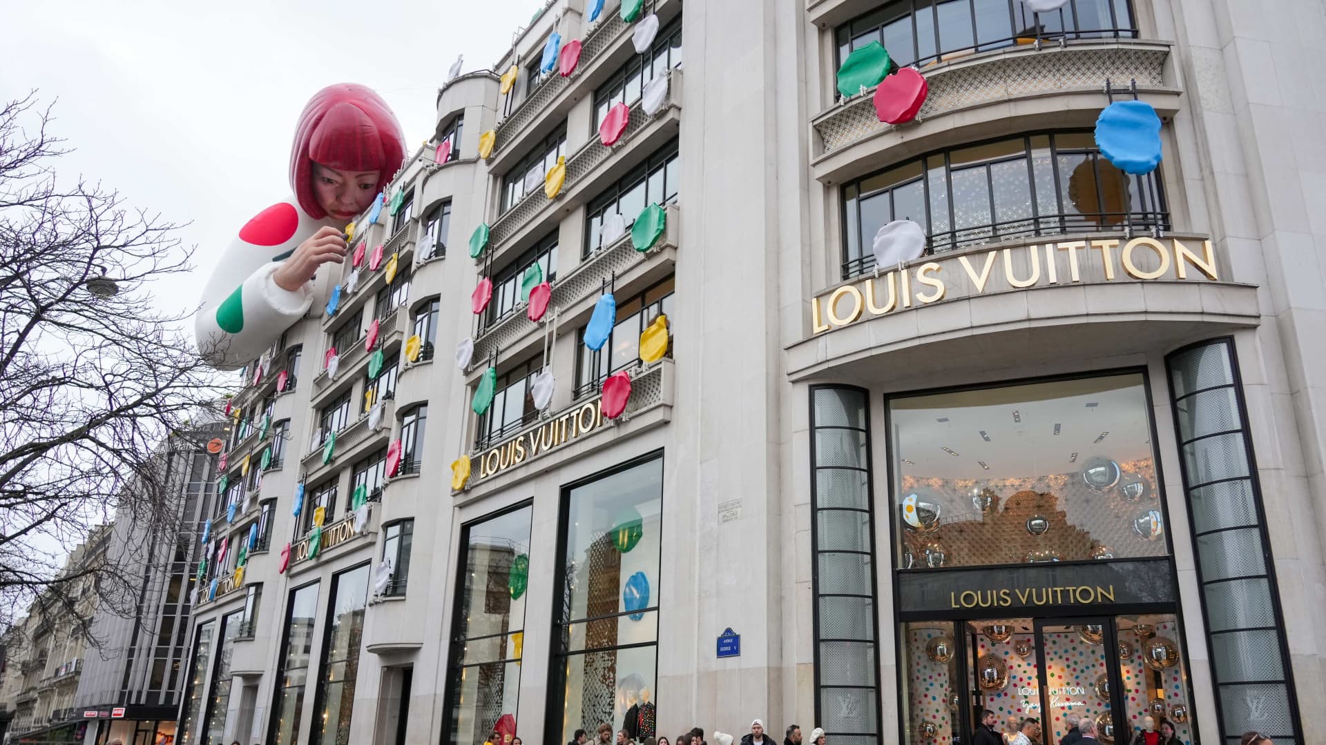 A Yayoi Kusama sculpture is displayed on the top of the Louis Vuitton's Champs Elysees store, on January 12, 2023 in Paris, France. This year the French Fashion house has launch a second collaboration with Yayoi Kusama.The first one was in 2012. The Yayoi Kusama x Louis Vuitton collection are now available in all Louis Vuitton's Stores Worldwide. (Photo by Edward Berthelot/Getty Images)
