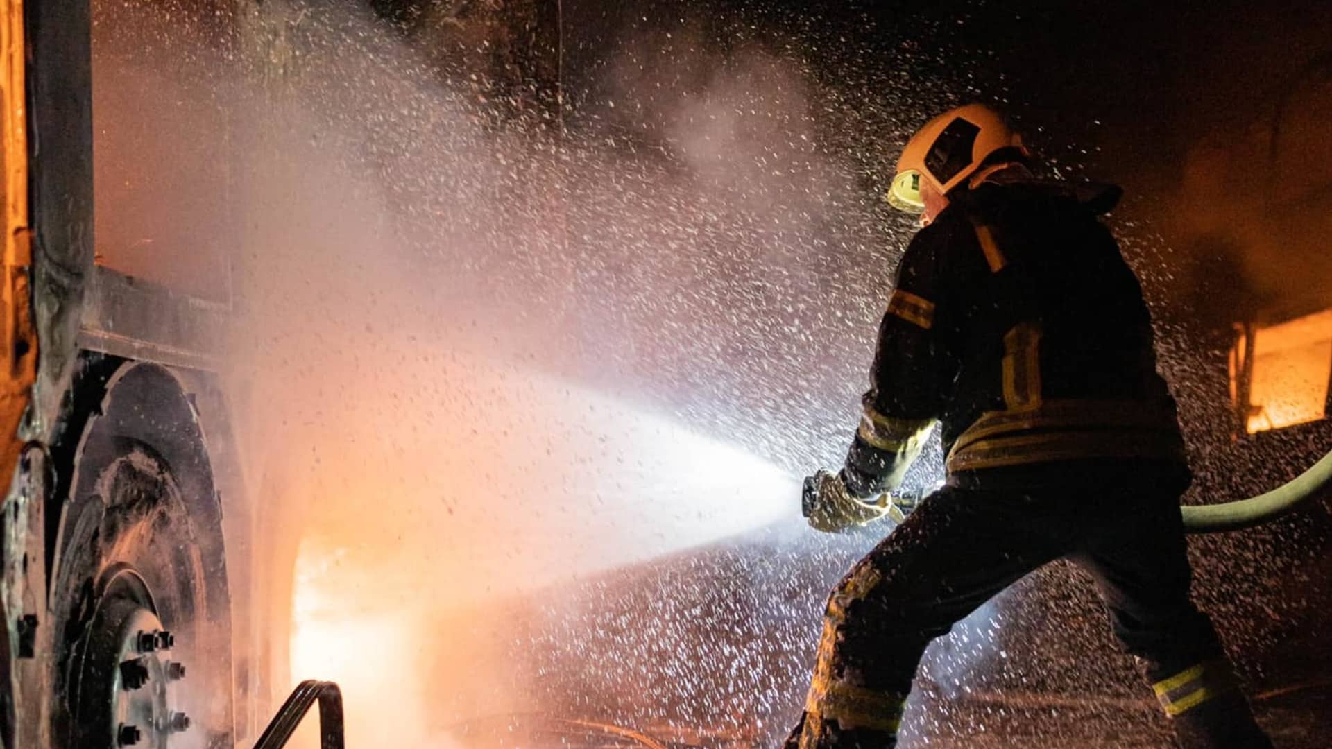 A firefighter at work in Kyiv in the early hours of May 16, 2023.