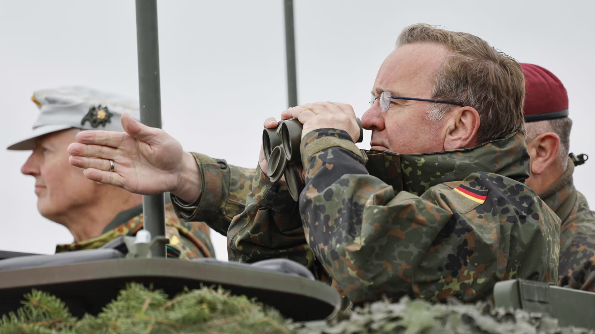 German Defense Minister Boris Pistorius observes a military exercise.