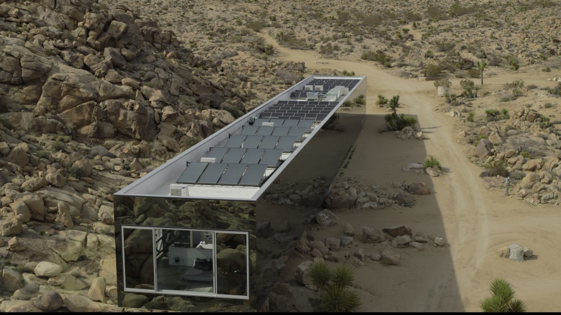 The rooftop of the Invisible House is equipped with an array of solar panels that supply the home with electricity, heat and hot water.