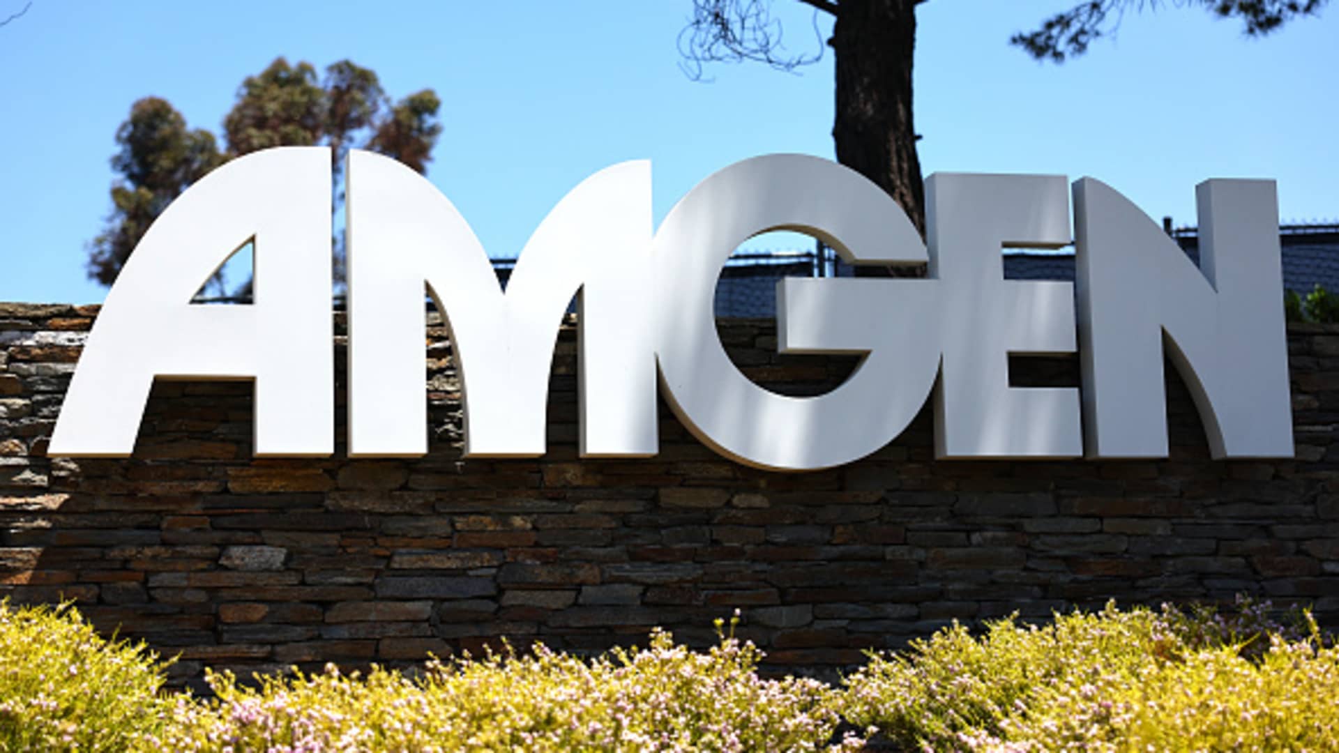 The Amgen logo is displayed outside Amgen headquarters in Thousand Oaks, California, on May 17, 2023.