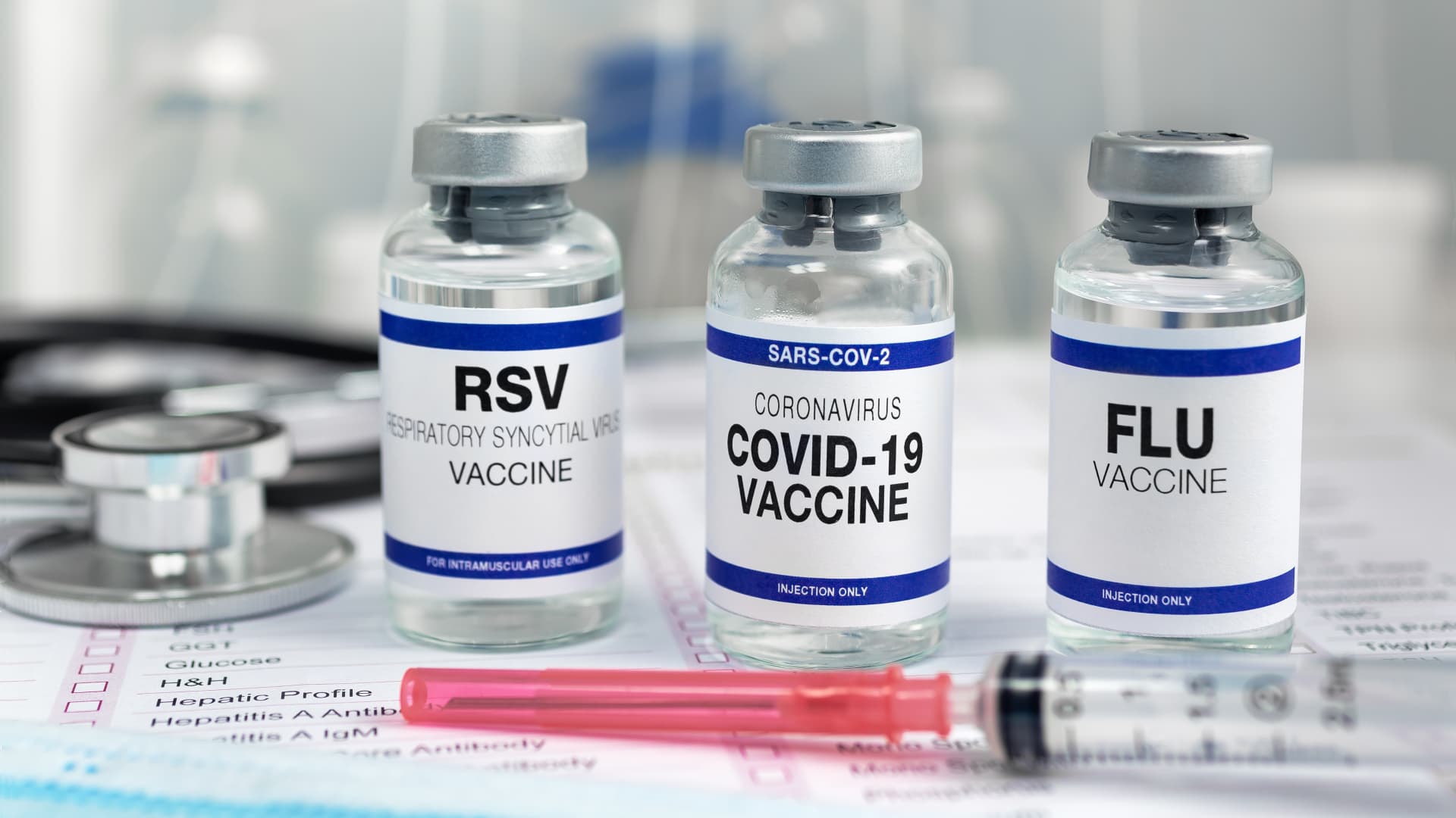 Bottles of vaccine for Influenza Virus, Respiratory Syncytial virus and Covid-19 for vaccination. Flu, RSV and Sars-cov-2 Coronavirus vaccine vials in the medical clinic