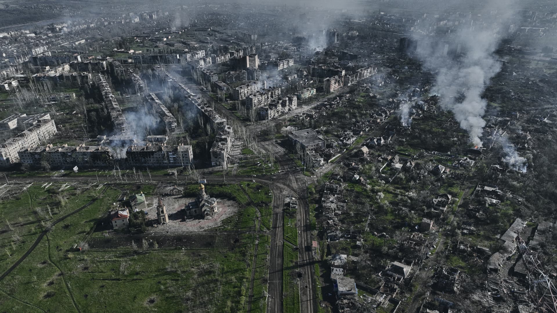 Smoke rises from buildings in this aerial view of Bakhmut, the site of the heaviest battles with Russian troops, in the Donetsk region of Ukraine on April 26, 2023.