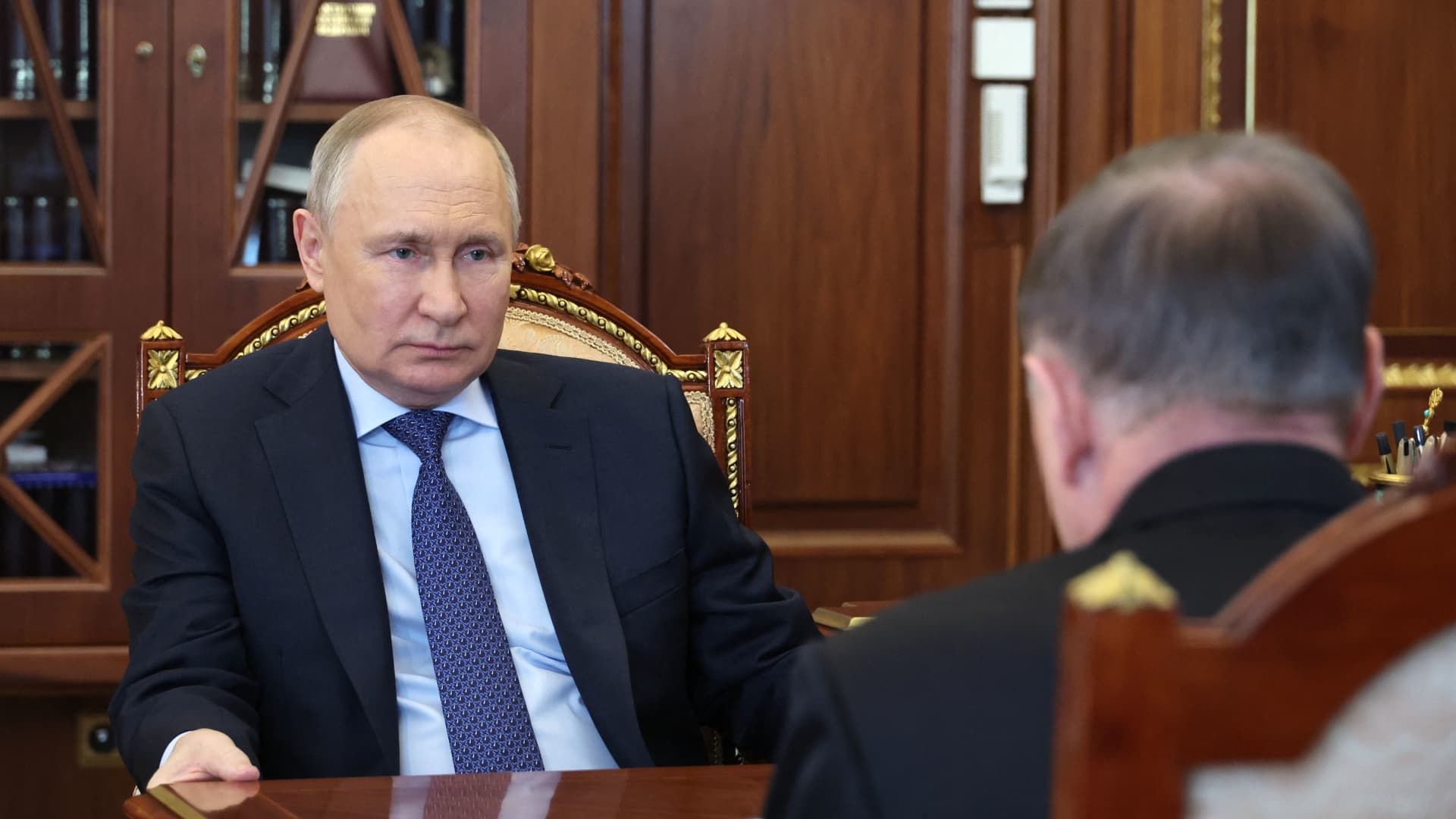 Russian President Vladimir Putin meets with Supreme Court chairman Vyacheslav Lebedev at the Kremlin in Moscow on May 22, 2023.