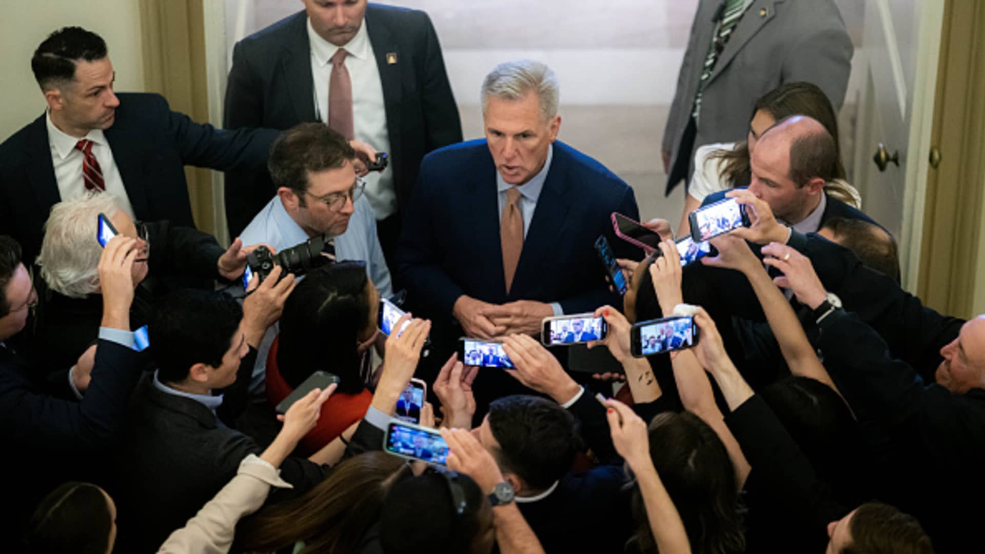 US House Speaker Kevin McCarthy, a Republican from California, center, speaks to members of the media while arriving to the US Capitol in Washington, DC, US, on Tuesday, May 23, 2023.