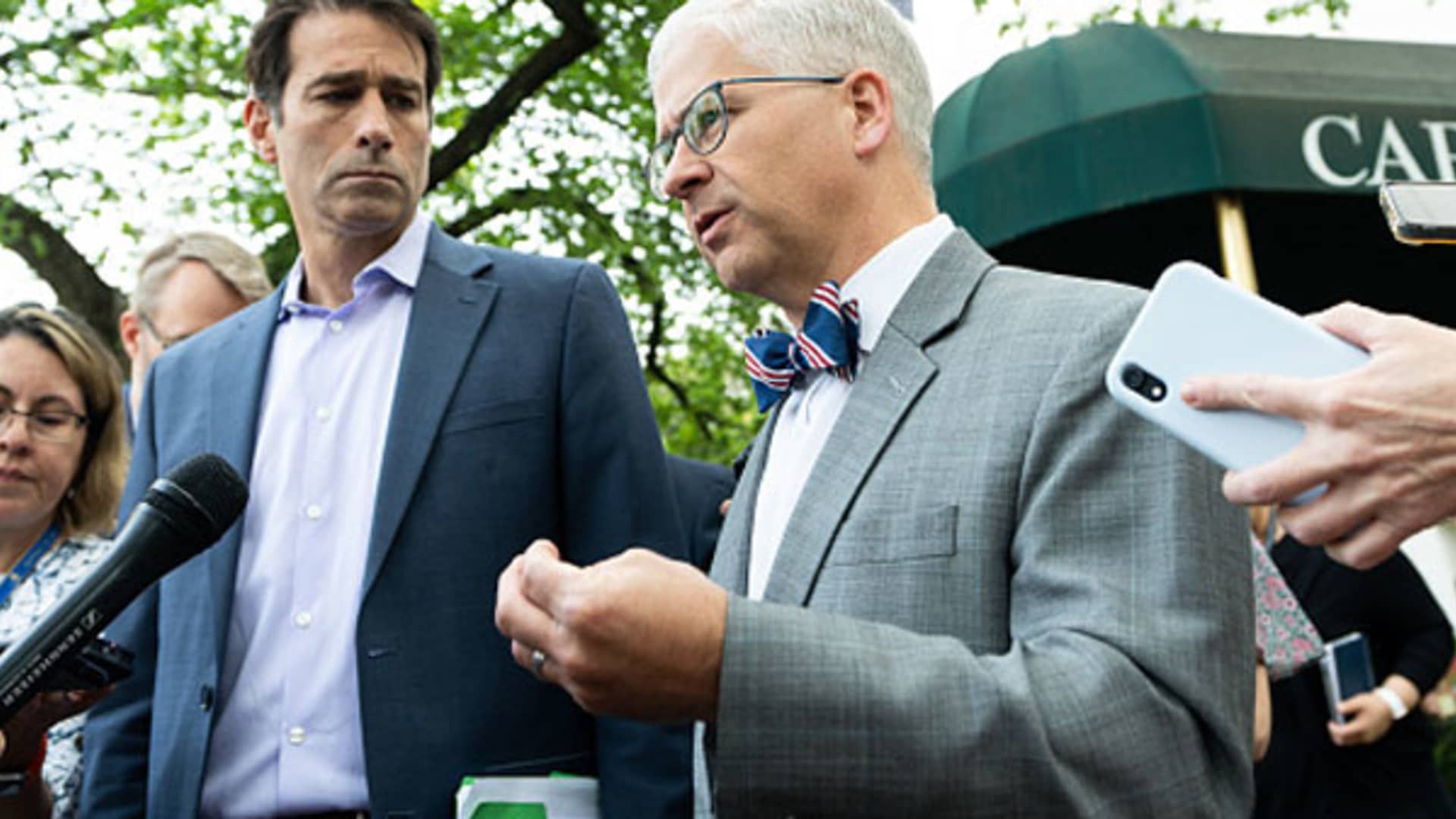 Rep. Garret Graves, R-La., left, and Rep. Patrick McHenry, R-N.C., speak to reporters about debit cieling negotiations as they leave the House Republicans' caucus meeting at the Capitol Hill Club in Washington on Tuesday, May 23, 2023.
