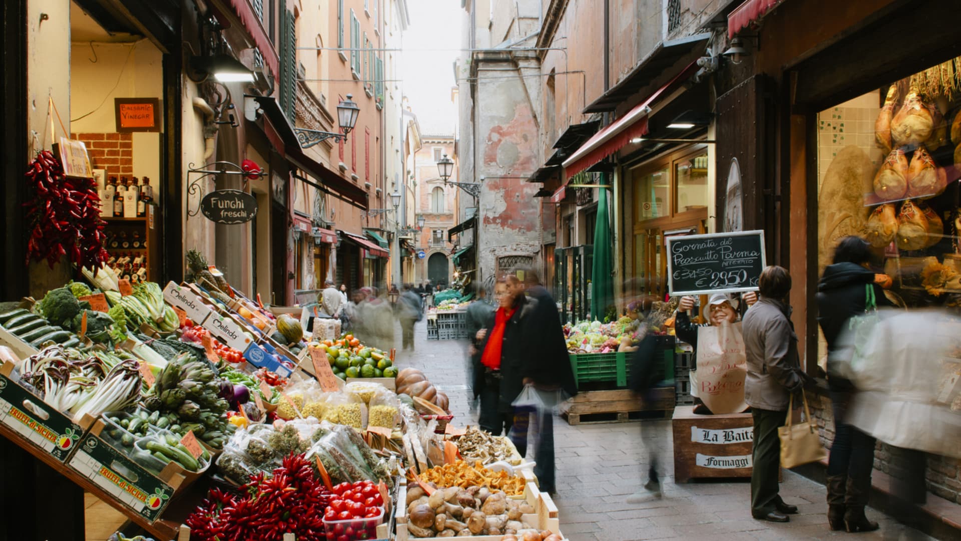 Bologna's food markets often tumble into the streets. Produce, cheese and wine from local farmers can be bought around the city.