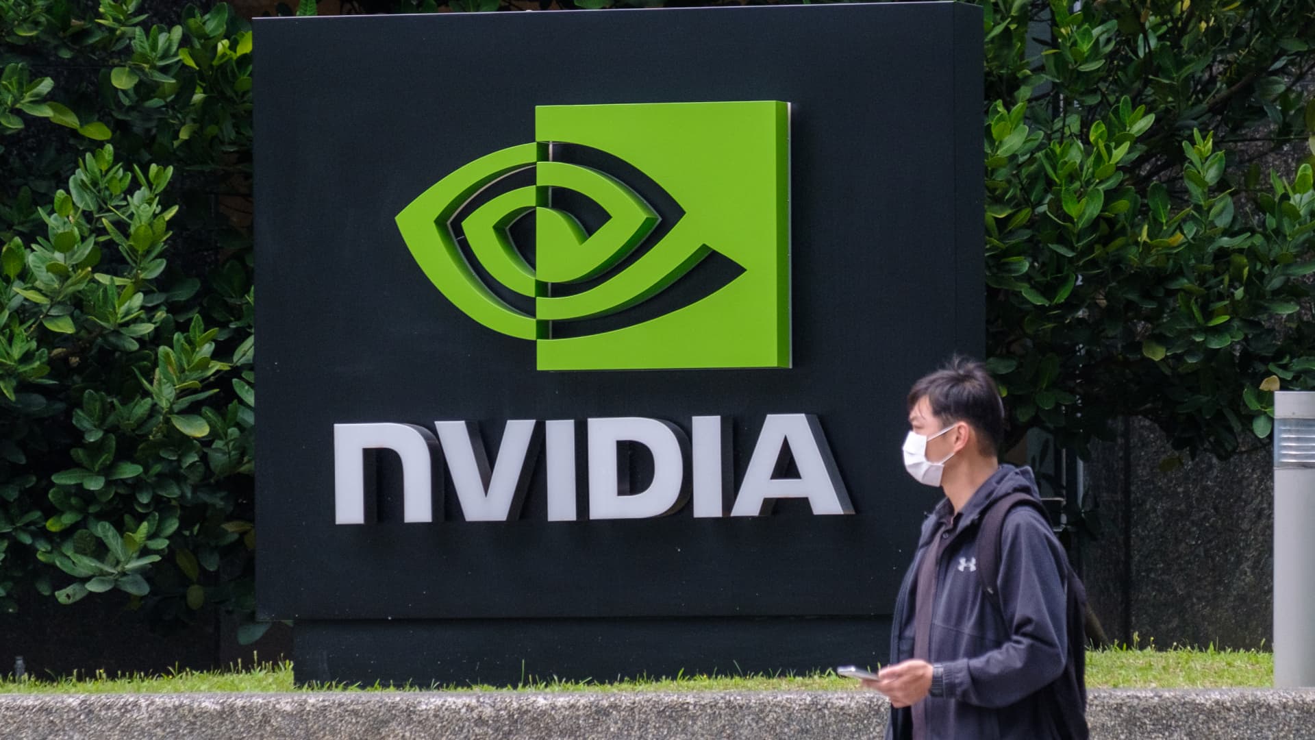 Nvidia crosses into  trillion market cap before giving back gains