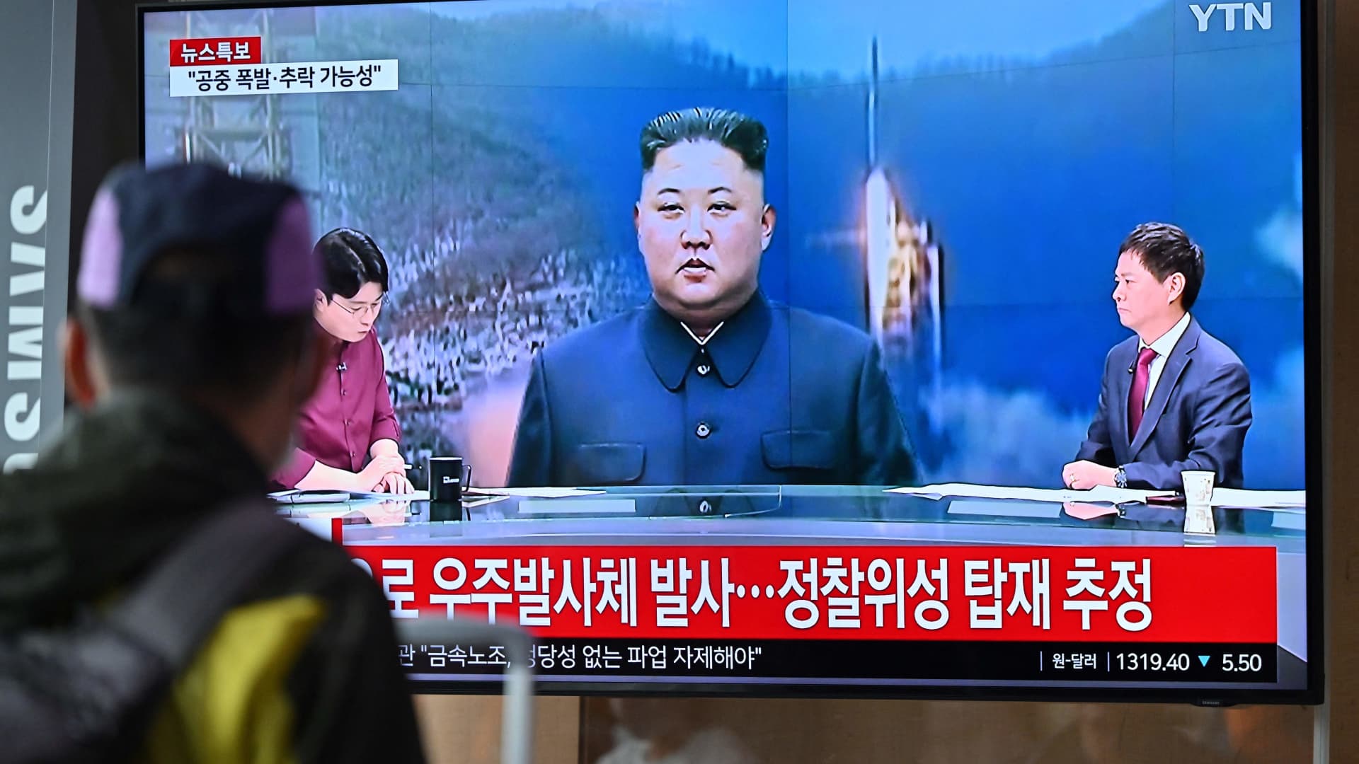 North Korea says its first spy satellite launch ends in failure, crashes into sea