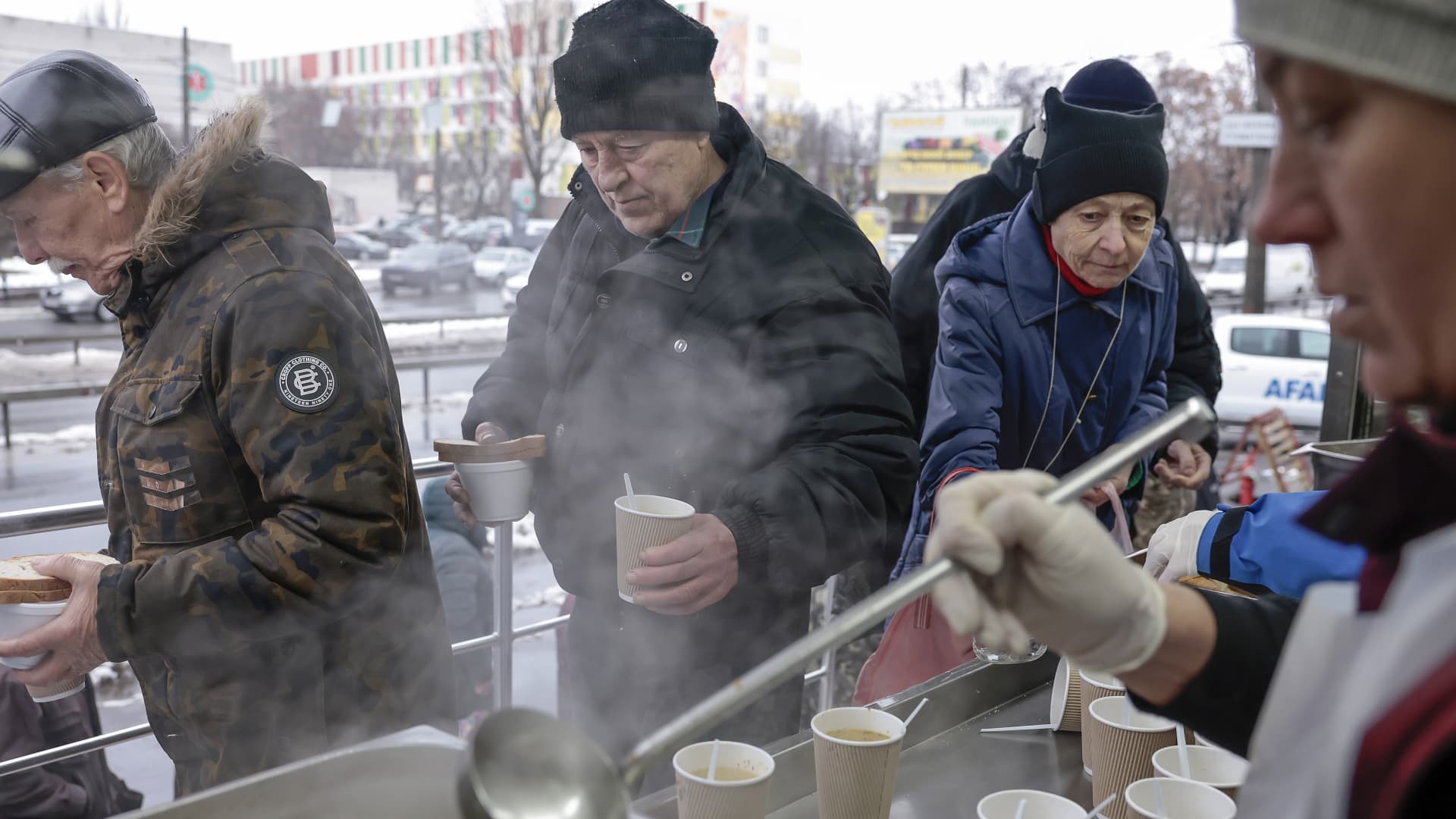 People receive food from AFAT - Disaster and Emergency Management Presidency on November 28, 2022 in Chernihiv, Ukraine.