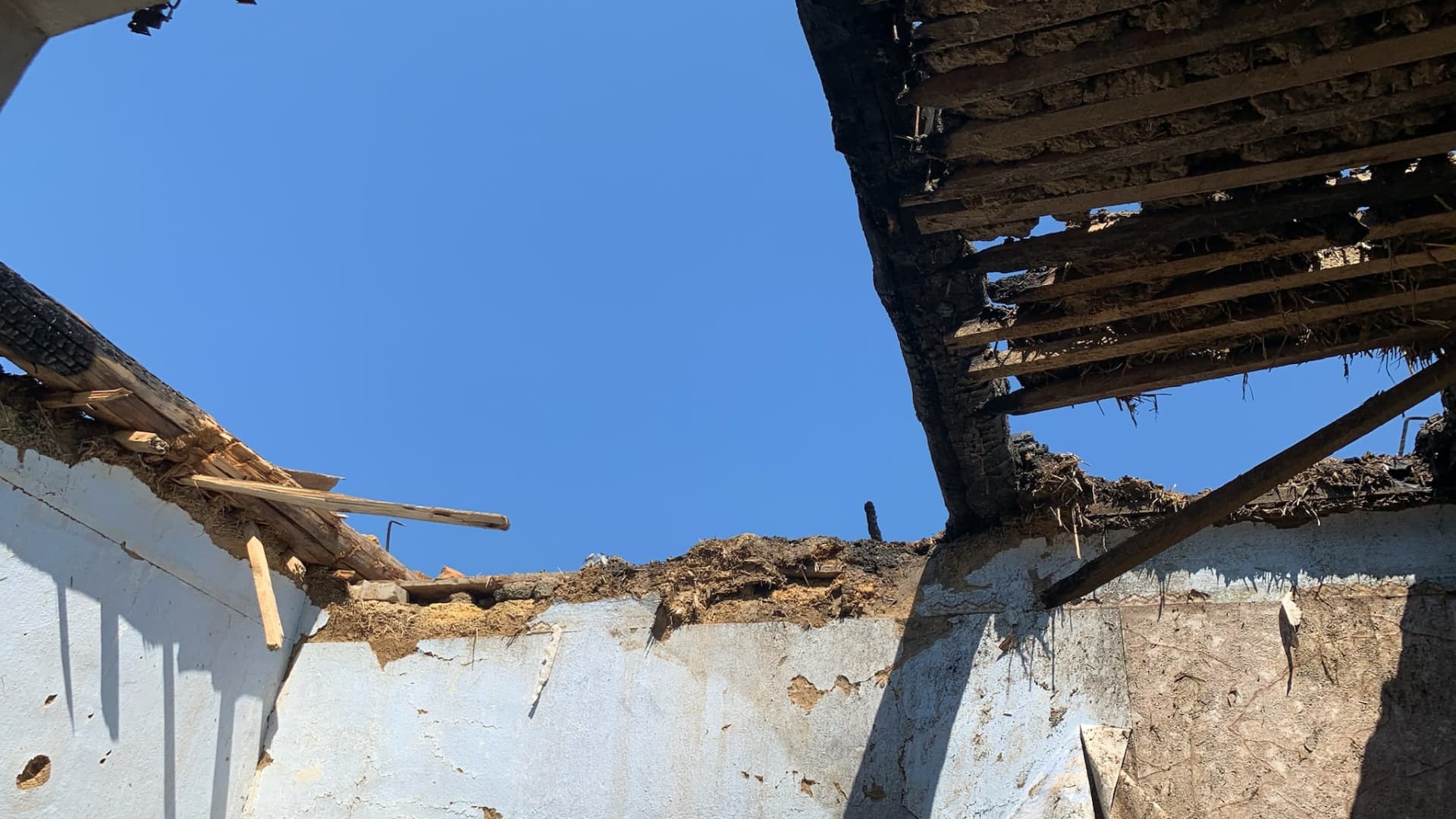 A view of a a destroyed house's roof after shelling due to an artillery attack as the Russia-Ukraine war continues in Kherson, Ukraine, on June 5, 2023.