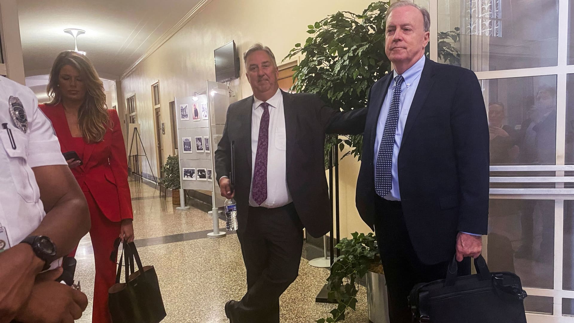 Lawyers for former U.S. President Donald Trump, including attorneys Lindsey Halligan, James Trusty and John Rowley, depart the U.S. Justice Department after meeting with Justice Department officials over the Trump Mar-a-Lago classified documents case, after Trump's lawyers last month sent the department a letter asking for a meeting with U.S. Attorney General Merrick Garland, in Washington, U.S. June 5, 2023. 