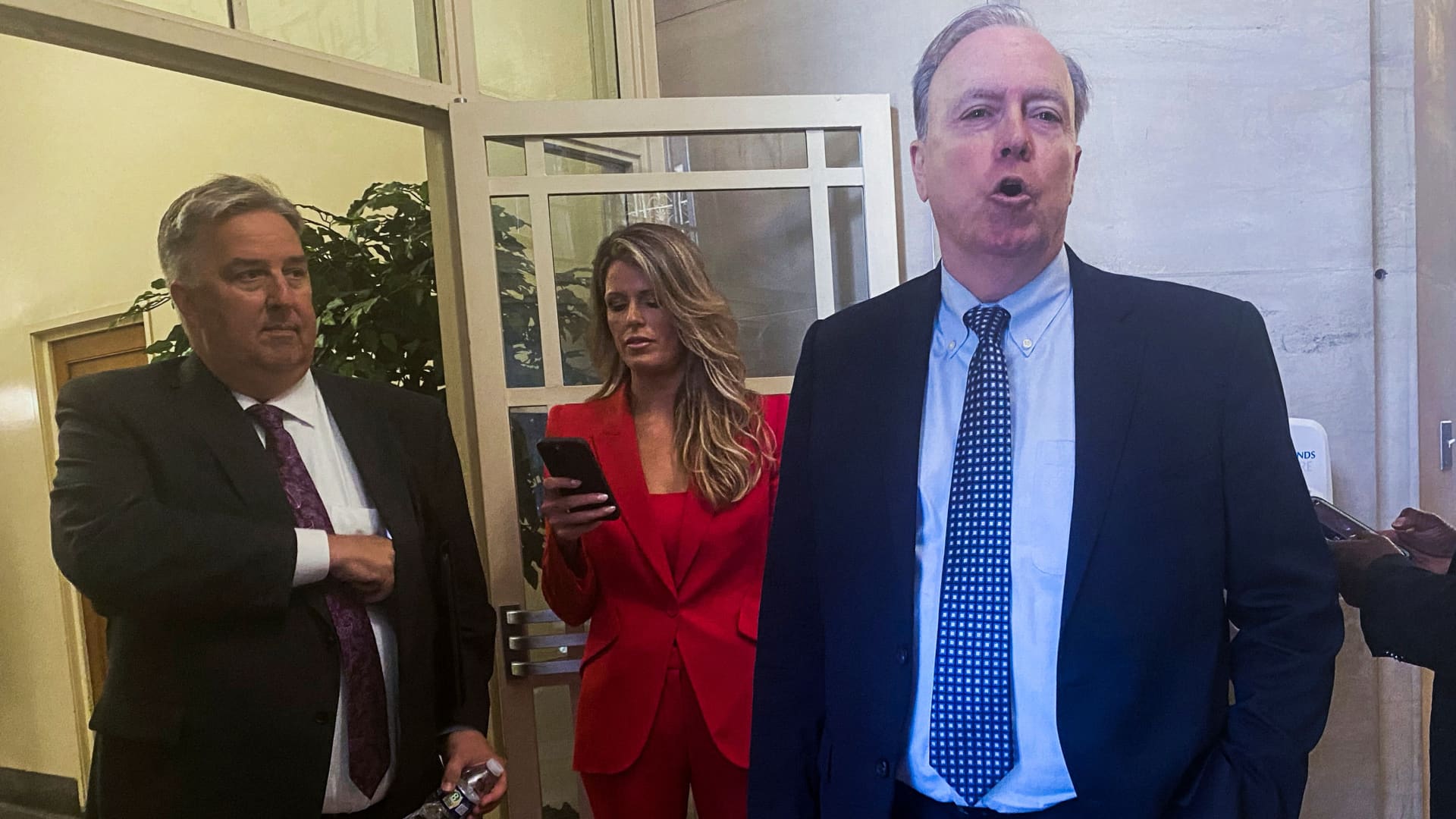 Attorneys for former U.S. President Donald Trump; James Trusty, Lindsey Halligan and John Rowley, depart the U.S. Justice Department after meeting with Justice Department officials over the Trump Mar-a-Lago classified documents case, after Trump's lawyers last month sent the department a letter asking for a meeting with U.S. Attorney General Merrick Garland, in Washington, U.S. June 5, 2023. 