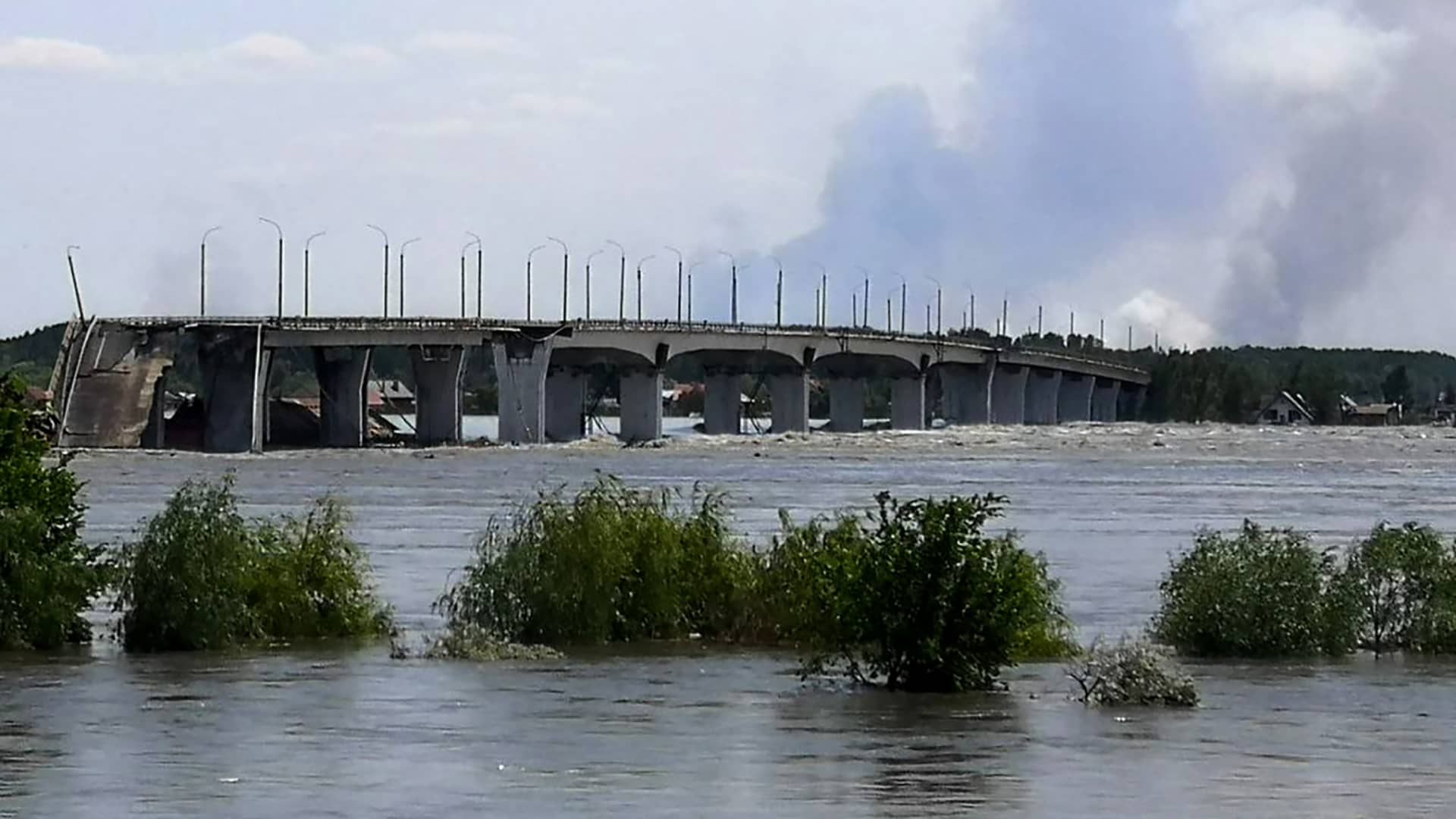 This general view shows a partially flooded area of Kherson, on June 6, 2023, following damage sustained at Kakhovka hydroelectric dam. A Russian-held dam in southern Ukraine was damaged on June 6, with Kyiv and Moscow accusing each other of blowing it up while locals were forced to flee rising waters. 