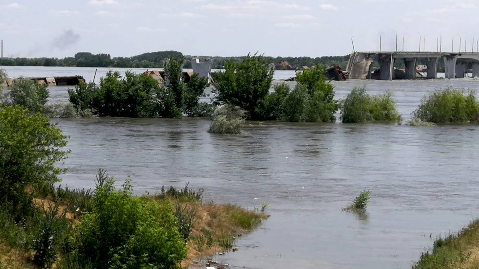 This general view shows a partially flooded area of Kherson, on June 6, 2023, following damage sustained at Kakhovka hydroelectric dam. The Russian-held dam in southern Ukraine was damaged on June 6, with Kyiv and Moscow accusing each other of blowing it up while locals were forced to flee rising waters.