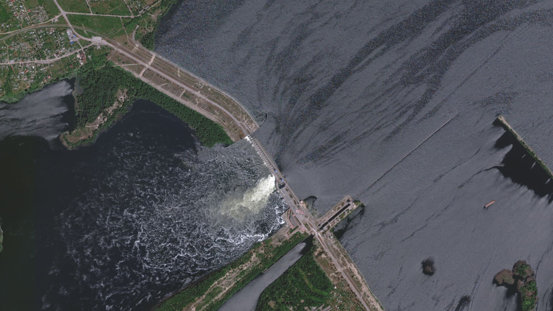 Satellite images of Kherson's Kakhovka Hydroelectric Power Plant on June 6, 2023. 