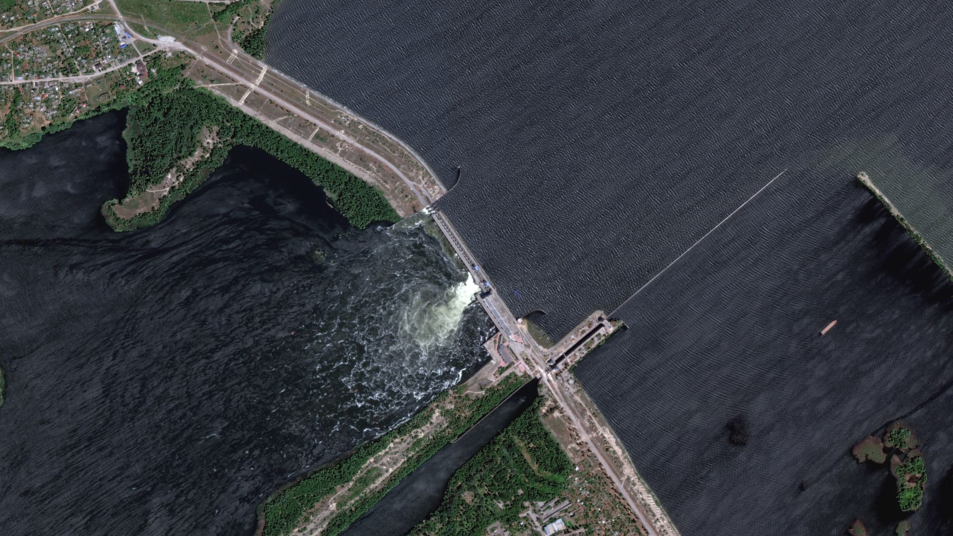 Satellite images of Kherson's Kakhovka Hydroelectric Power Plant on June 6, 2023. 