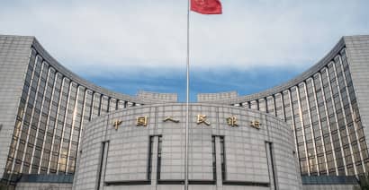 China's central bank governor says there's room to cut banks' reserve requirements