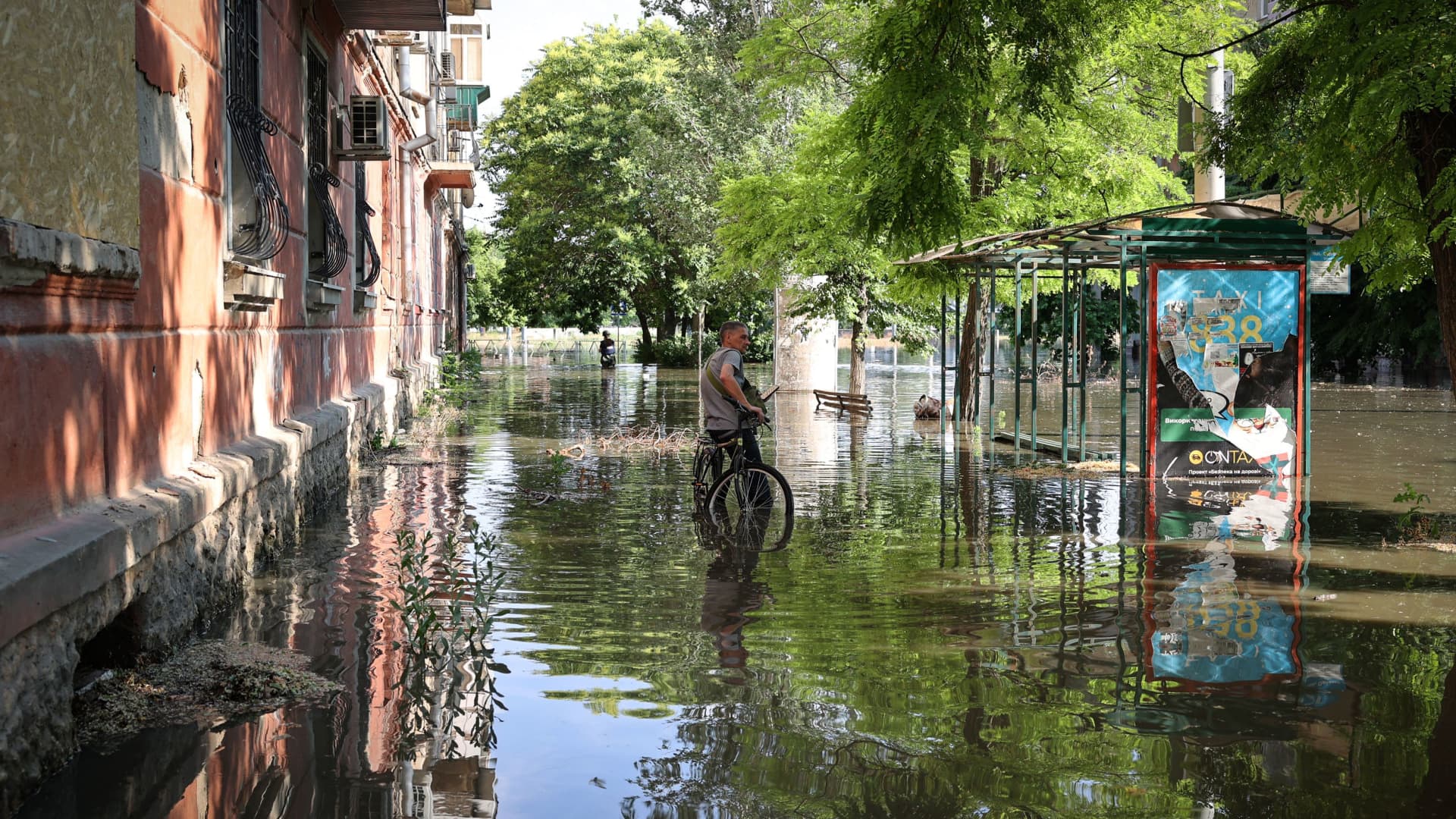 A street in the city of Kherson flooded after the Nova Kakhovka hydroelectric power plant dam was damaged, on June 6, 2023.